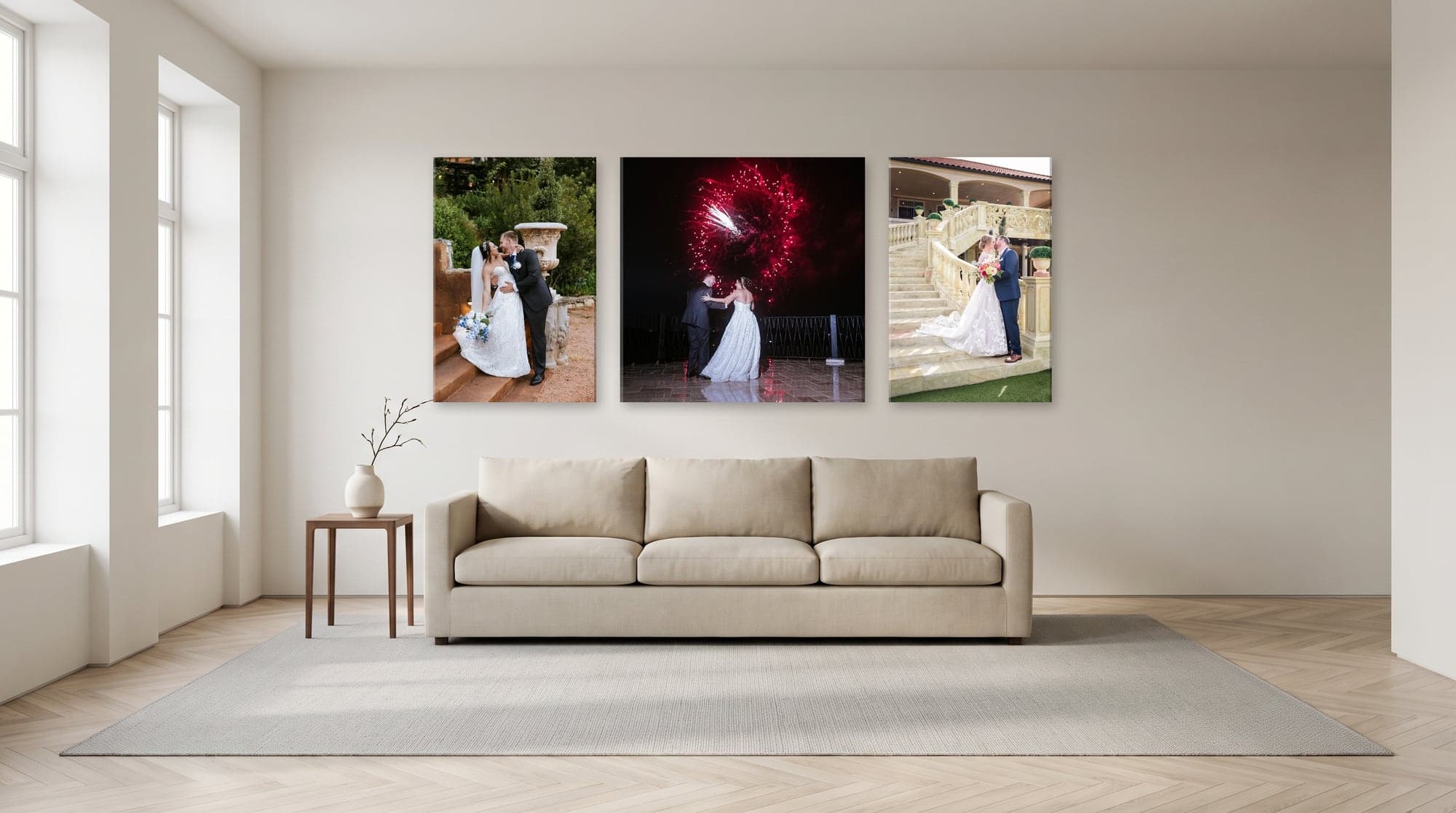 A living room wall above a sofa hung with three gallery-wrapped canvases: a 24 by 36 inch, a 36 by 36 inch square, and a second 24 by 36 inch