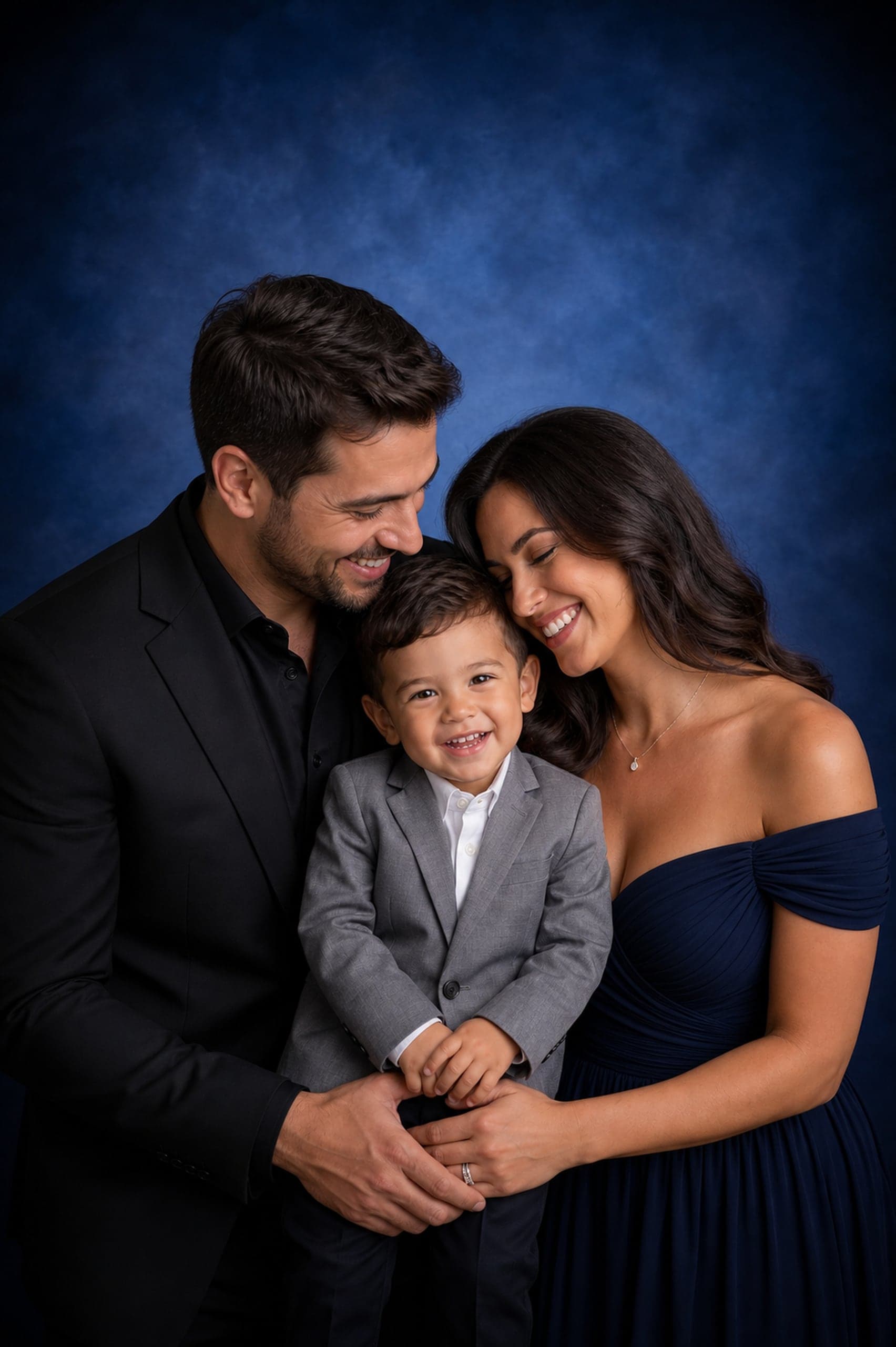 Parents with their son, an intimate studio family portrait