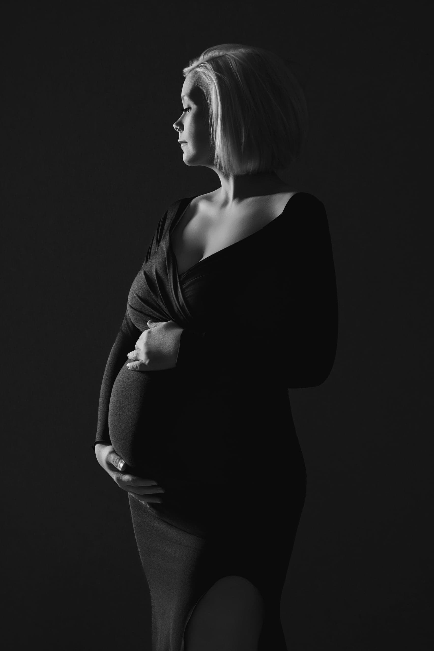 Black-and-white profile maternity portrait