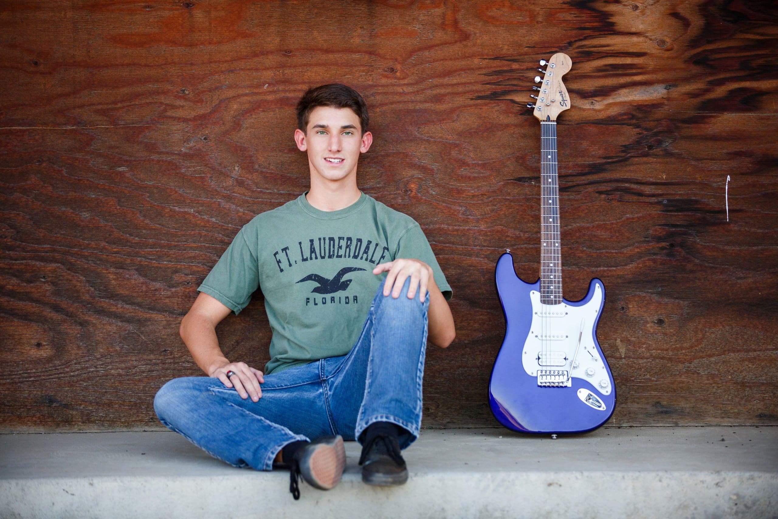 Senior portrait with his electric guitar