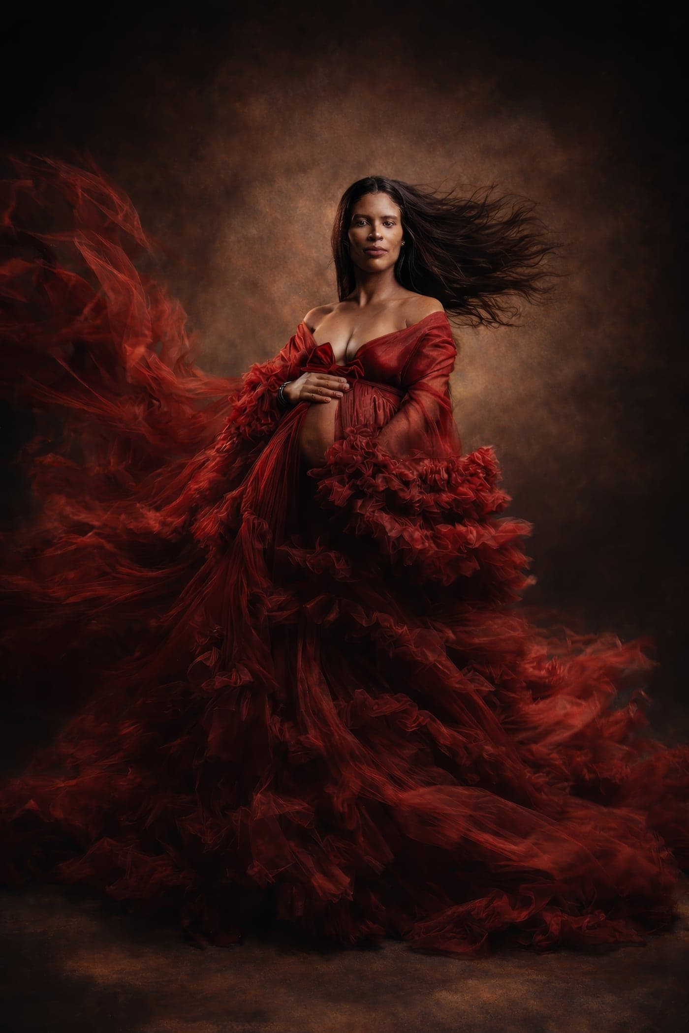 Fine-art portrait in a red gown