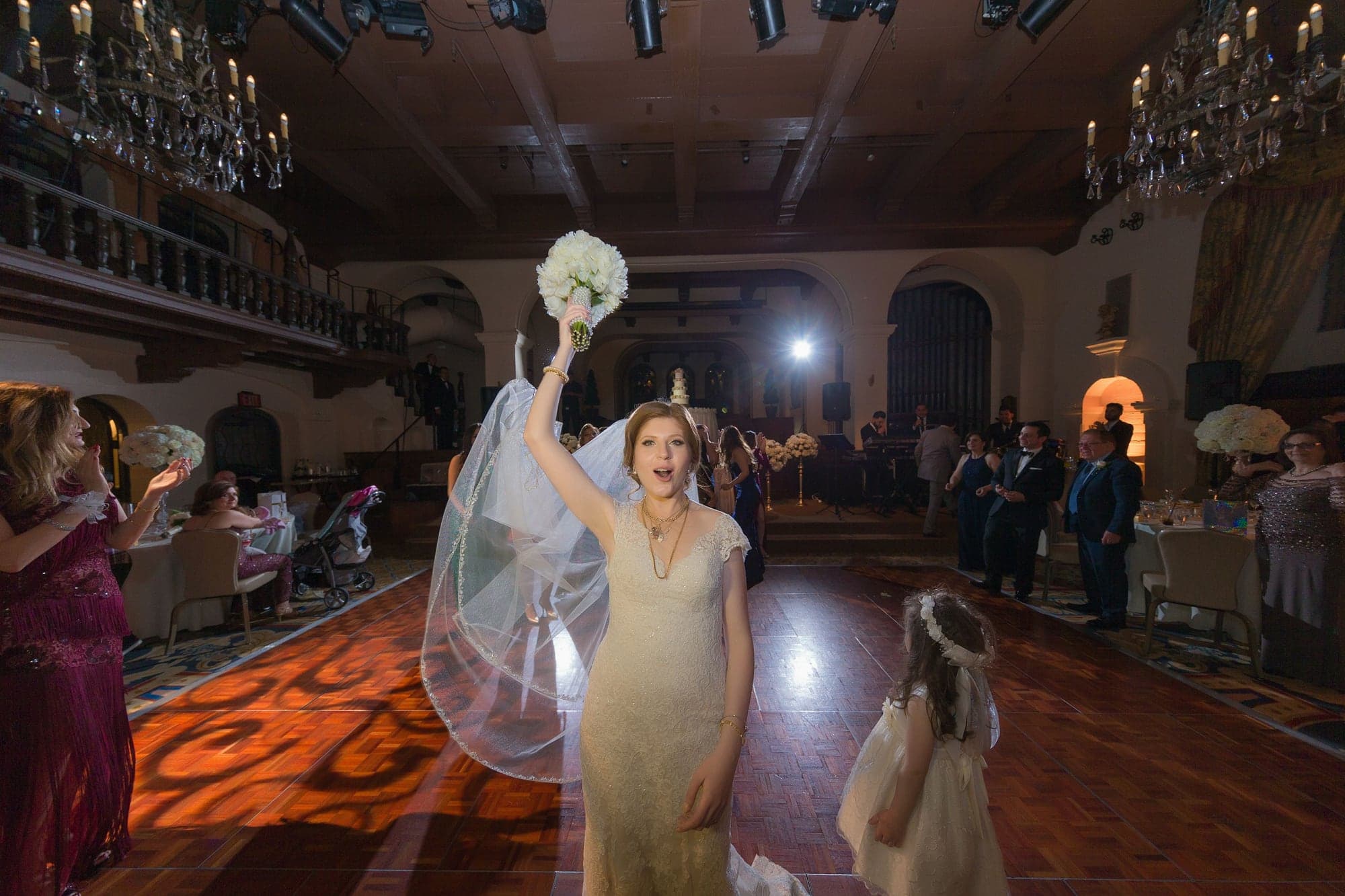 Bride celebrating during the Mission Inn reception