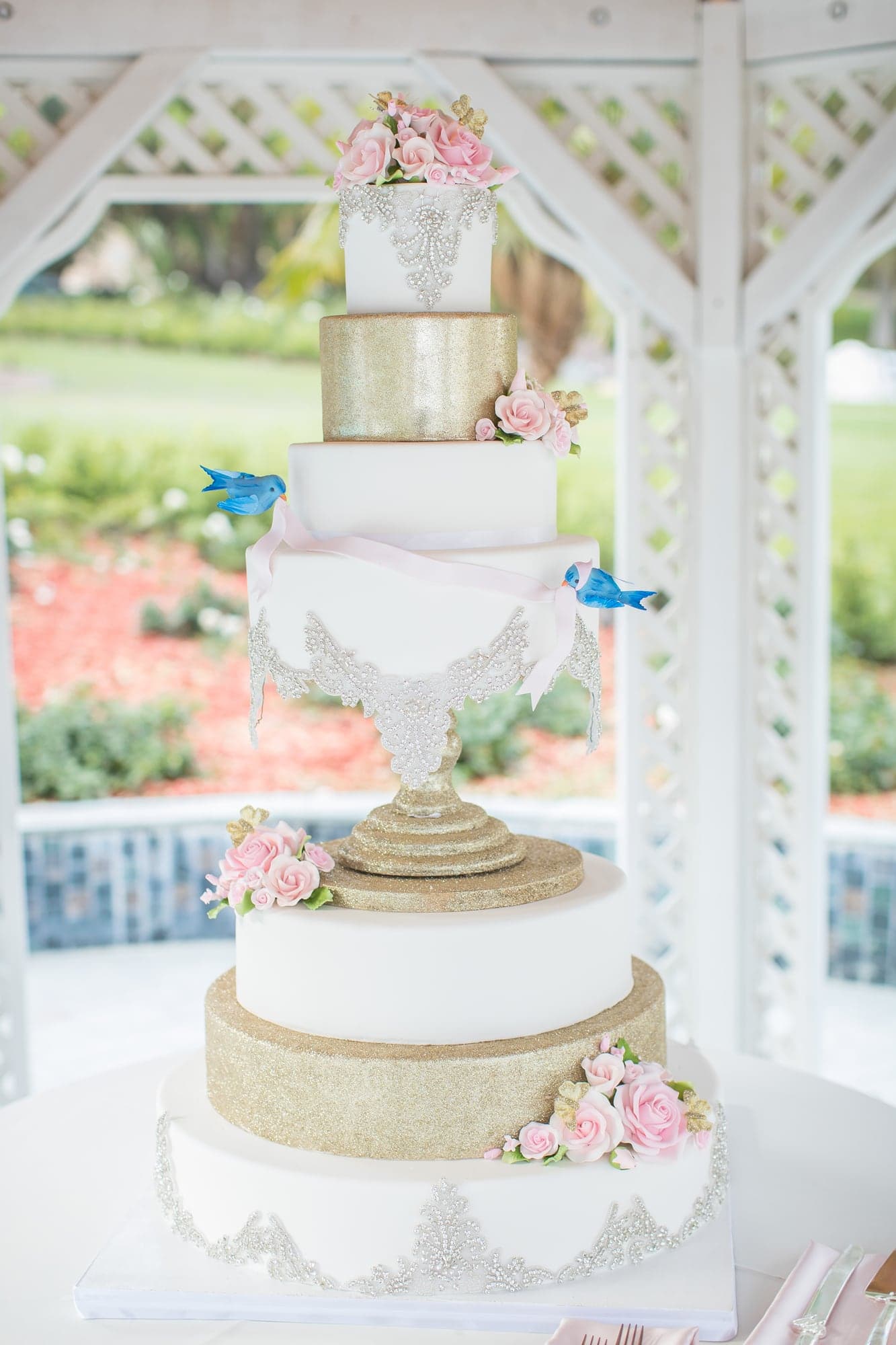 Blush and gold wedding cake