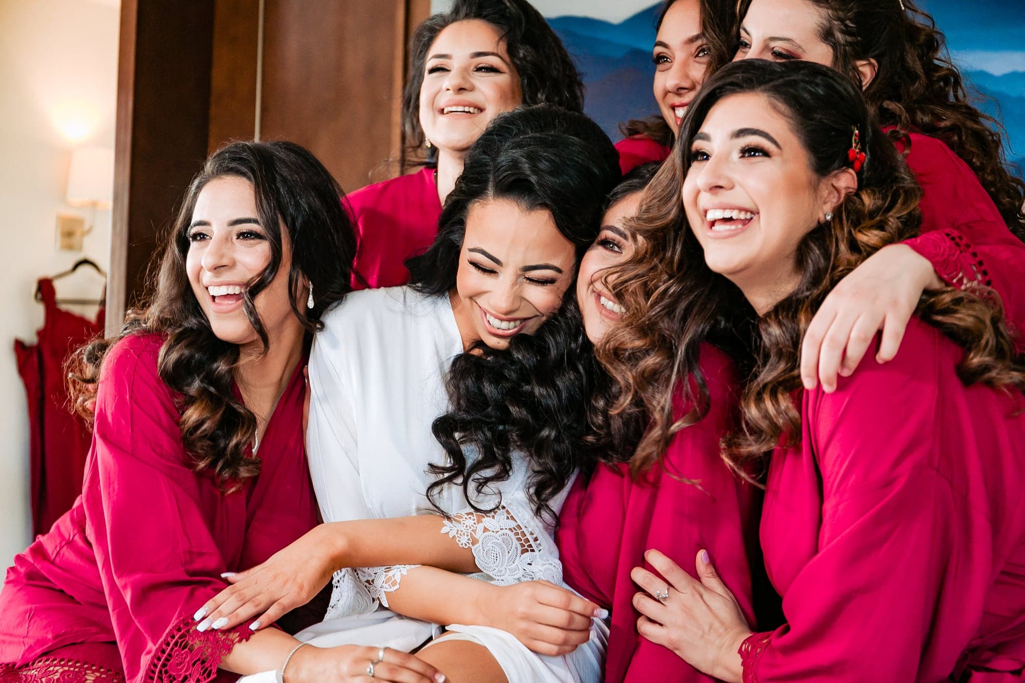 Mary celebrating with her bridesmaids