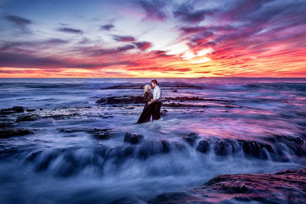 The storybook Pirate Tower and rocky point at Victoria Beach in Laguna Beach, reachable across the sand at low tide.