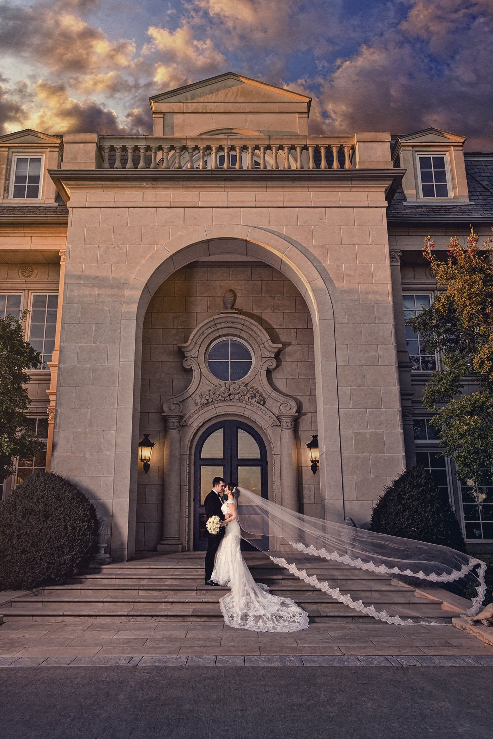 Cathedral veil cascading down the entry steps of The Olana