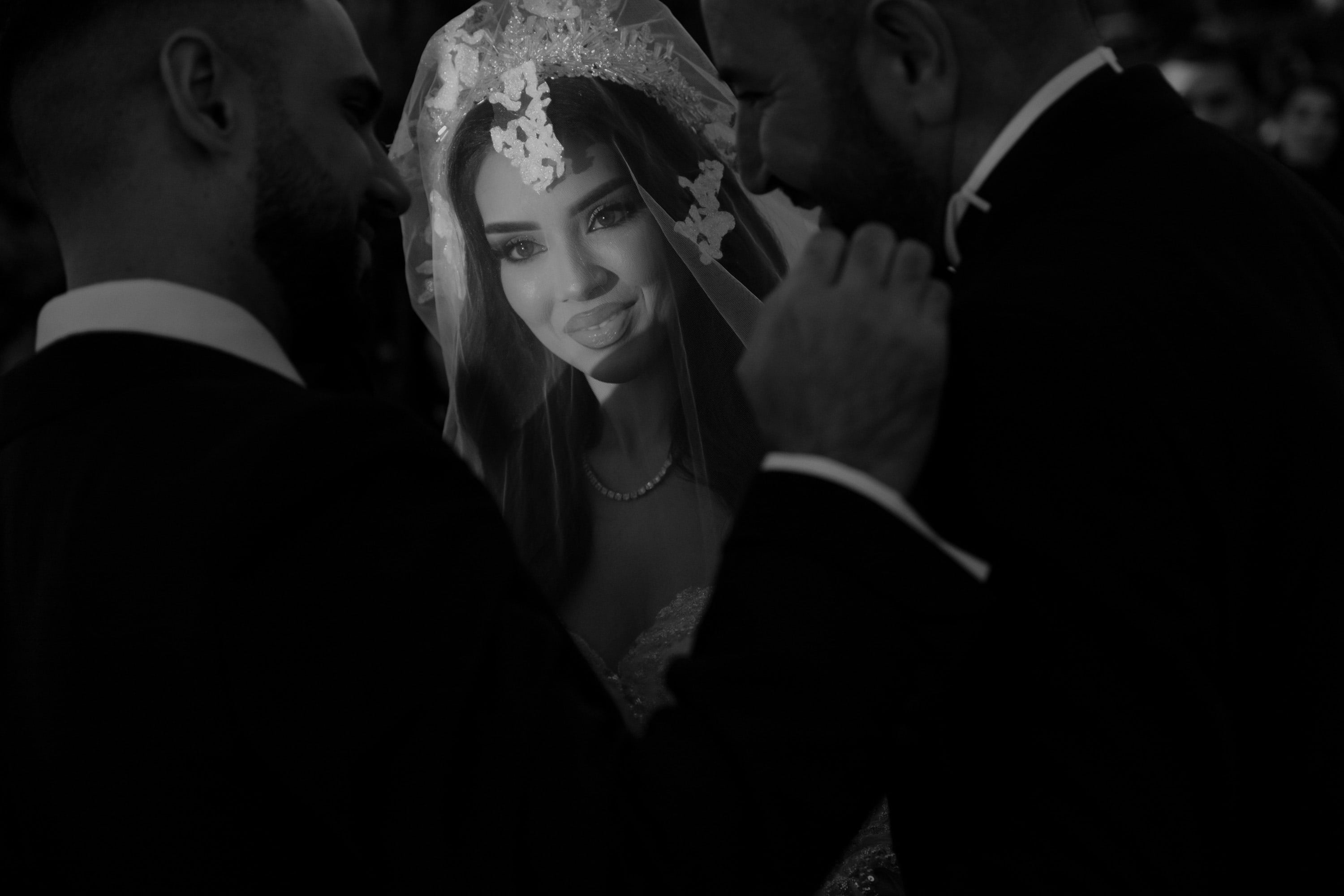 Bride reflected in a mirror during a quiet getting-ready moment