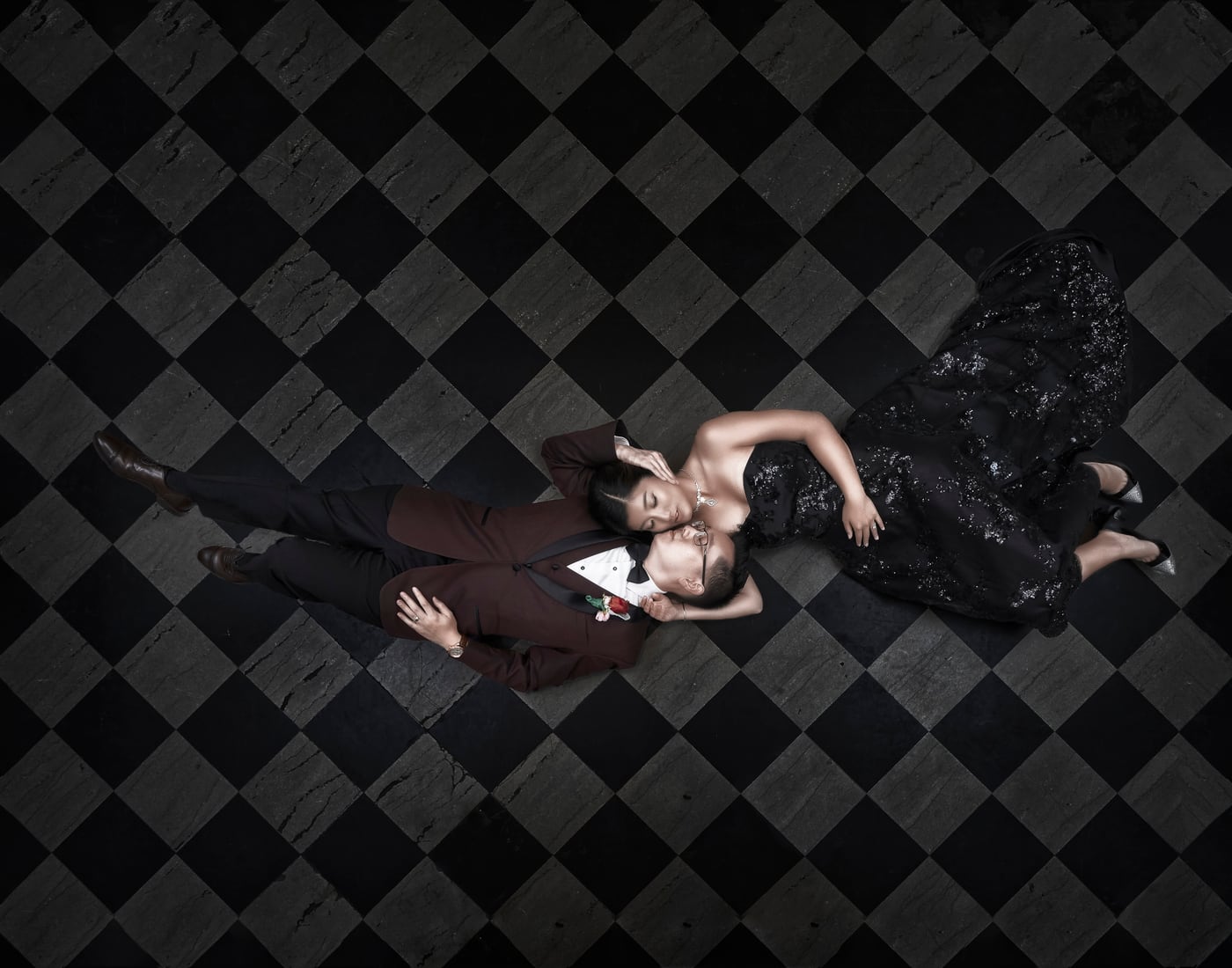 A graphic overhead portrait of a newlywed couple