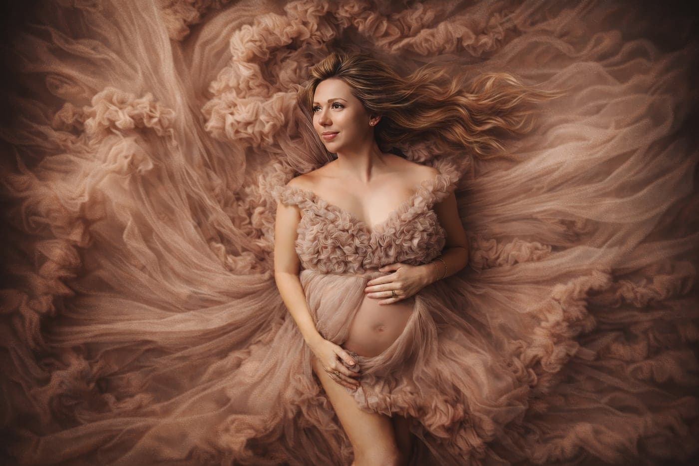 A studio maternity gown in motion