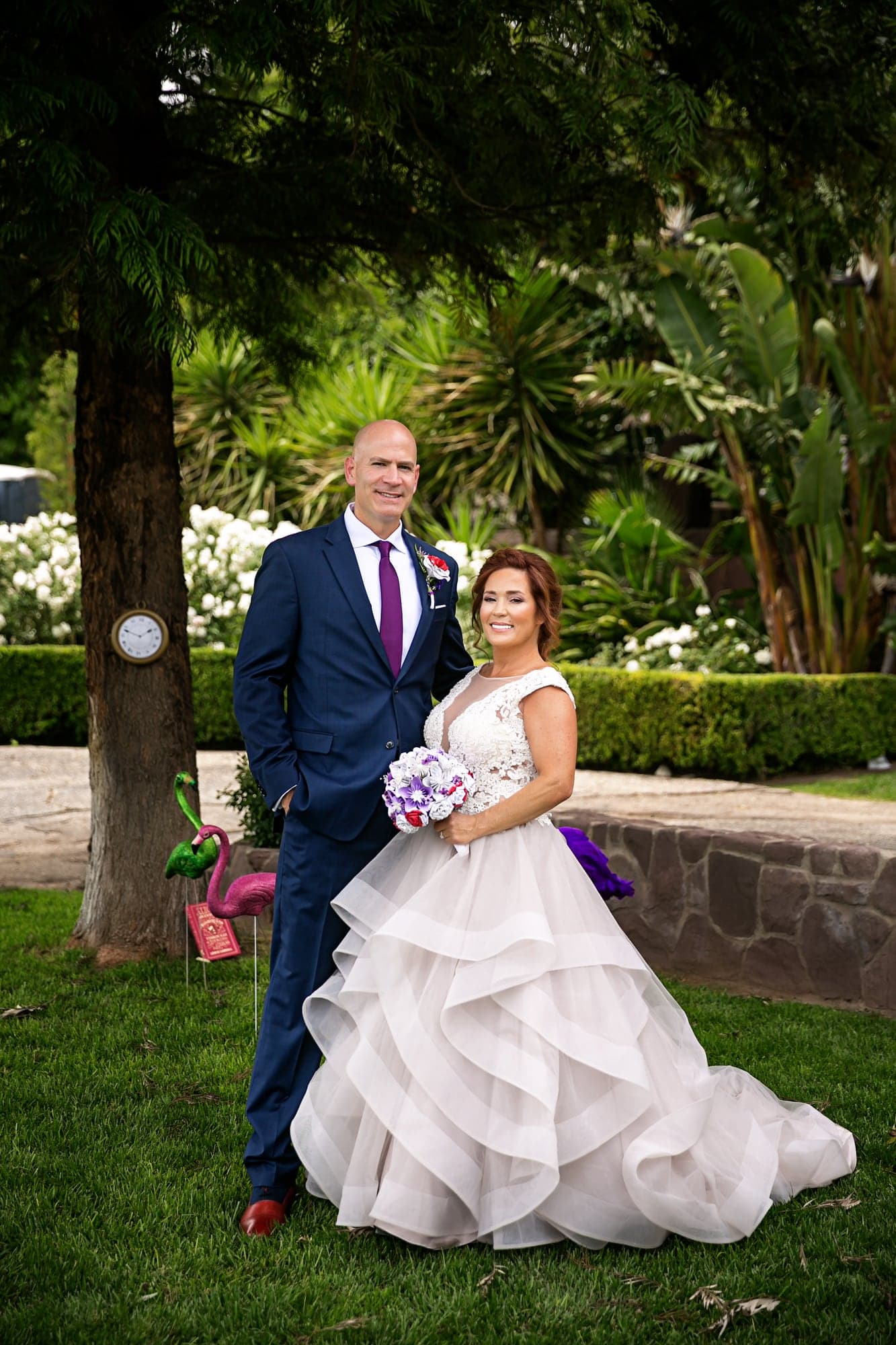Wedding couple standing together in the garden