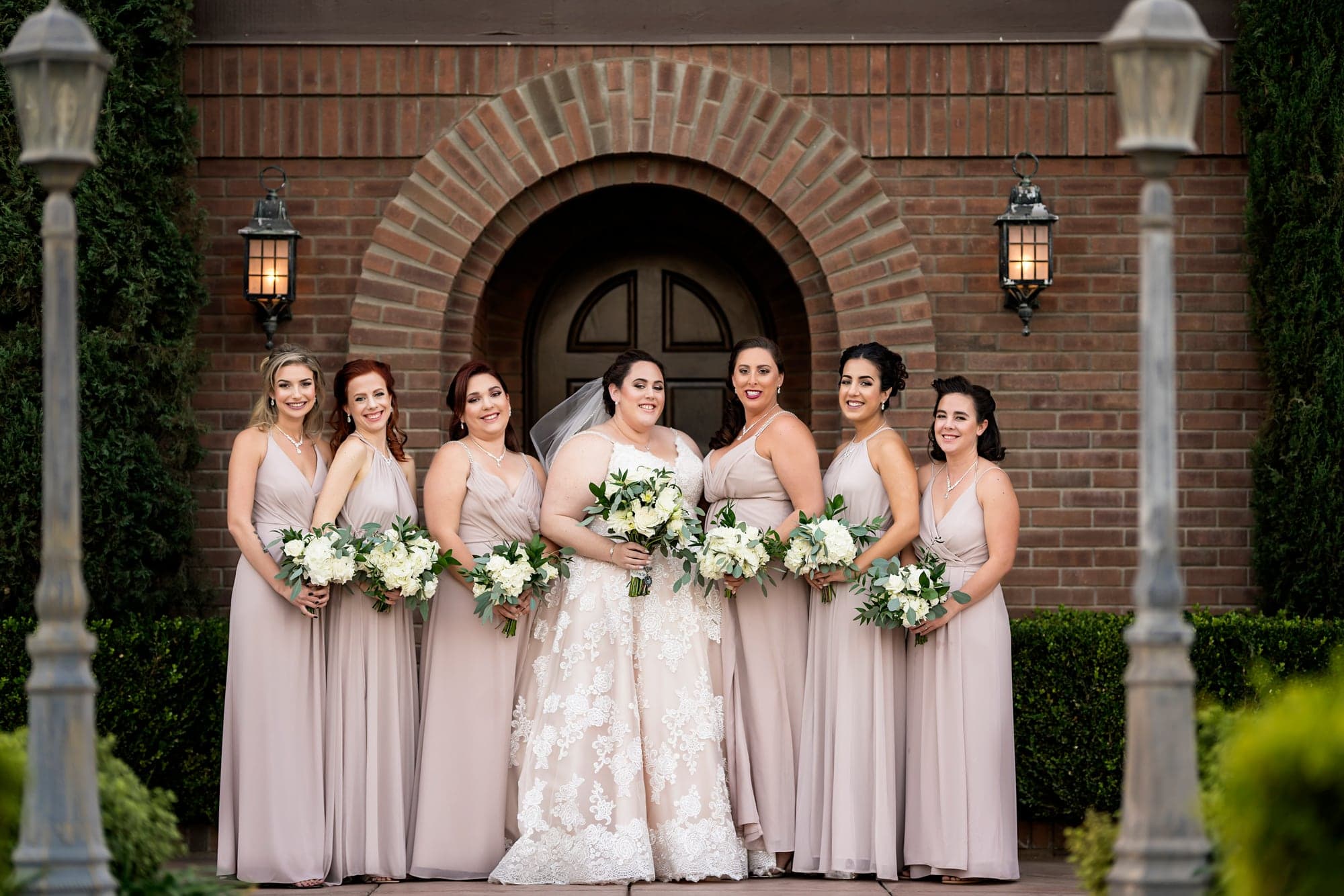 The bride and blush-clad wedding party