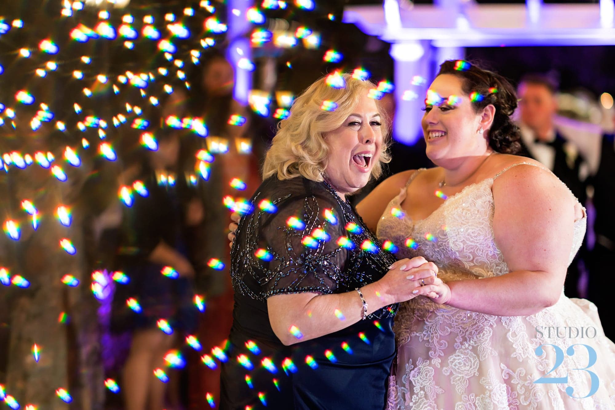 A joyful family dance at the reception