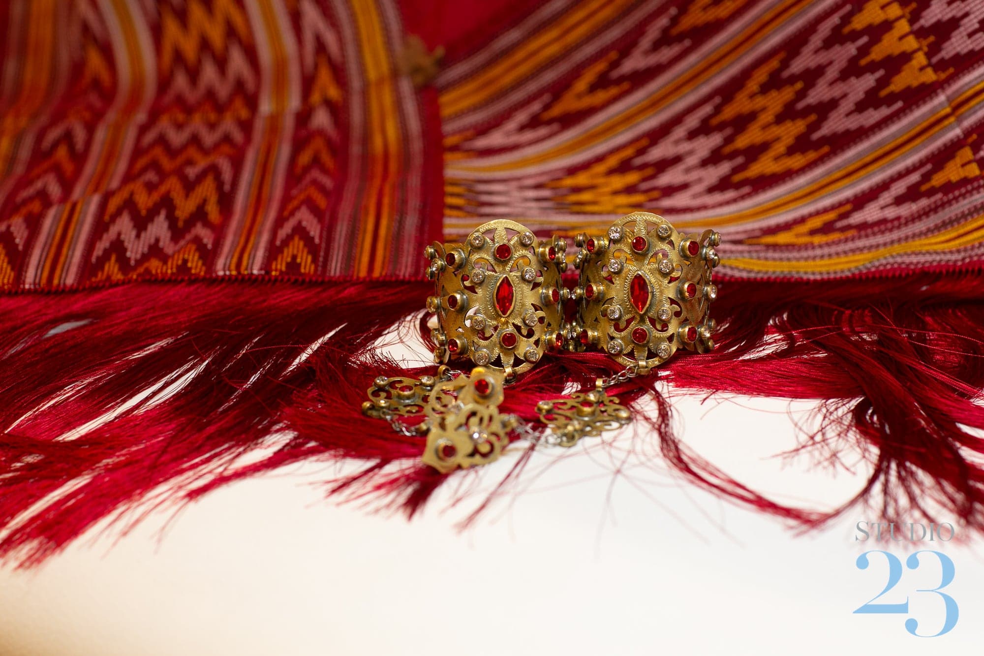 Traditional wedding jewelry and patterned accessories