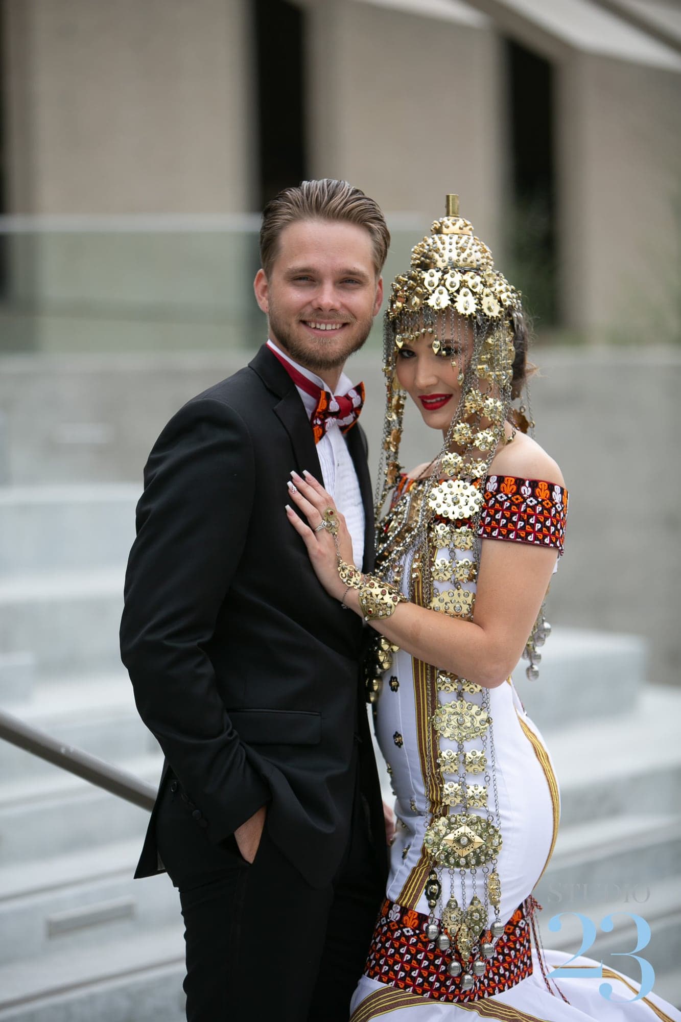 Aygul and Cameron in traditional wedding attire