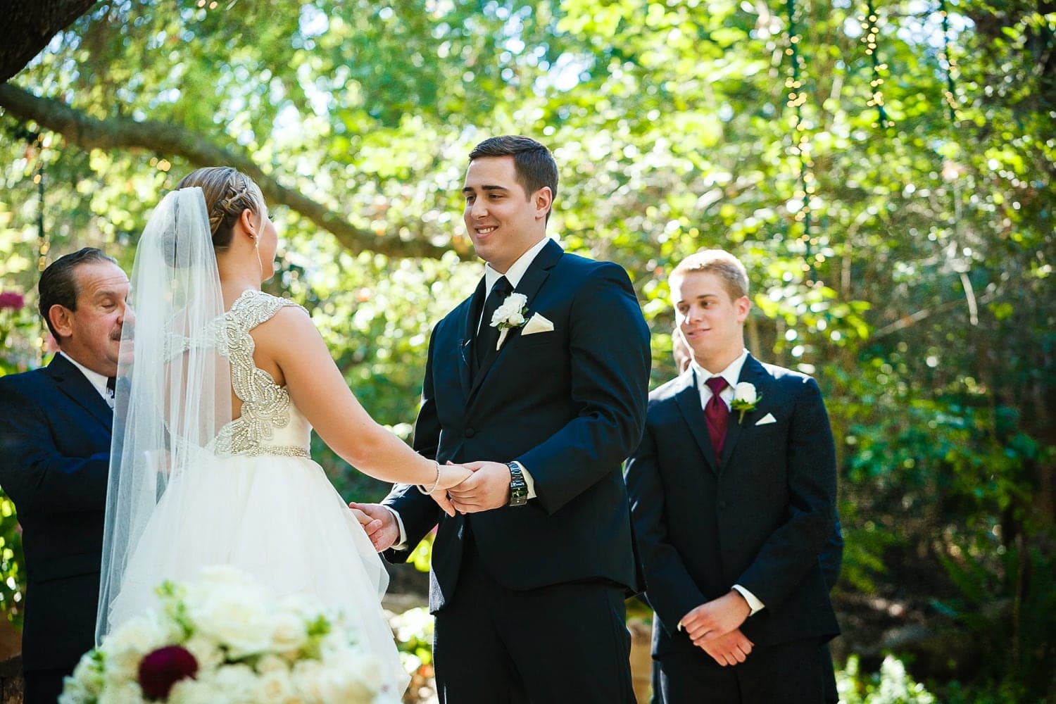 Kelly and John exchanging vows at Calamigos Ranch Pavilion
