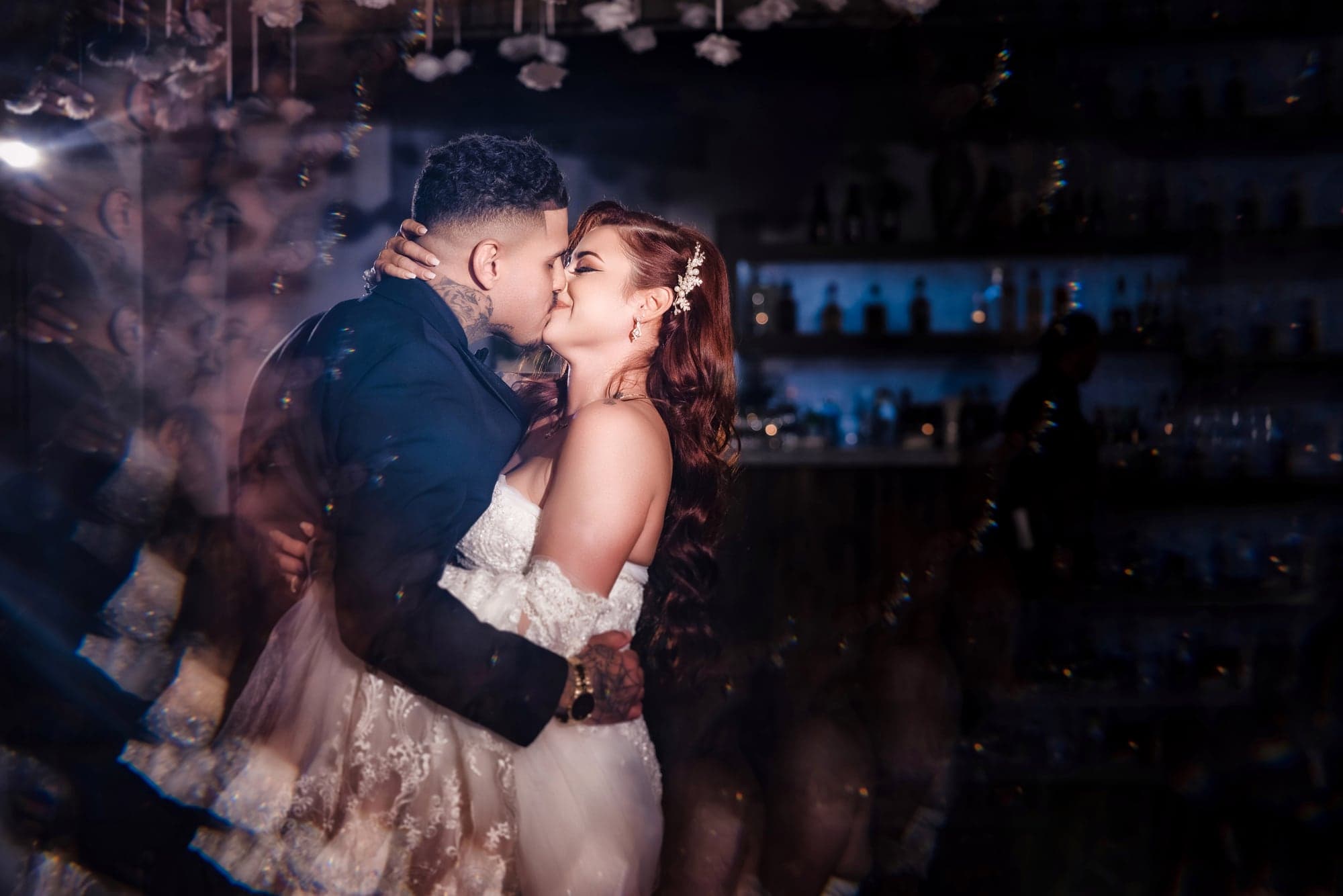 Gina and Alonso dancing together during their Calamigos Ranch reception
