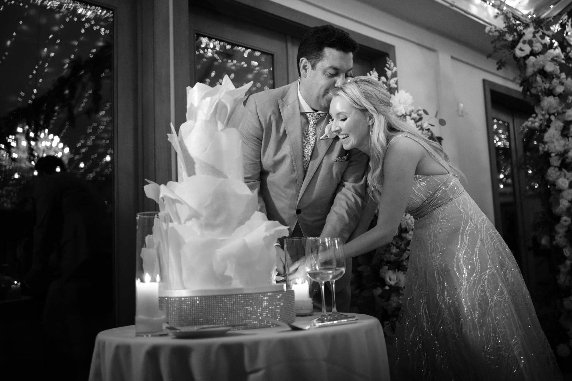Karolina and Jonathan together in a dramatic black-and-white nighttime portrait at Calamigos Ranch