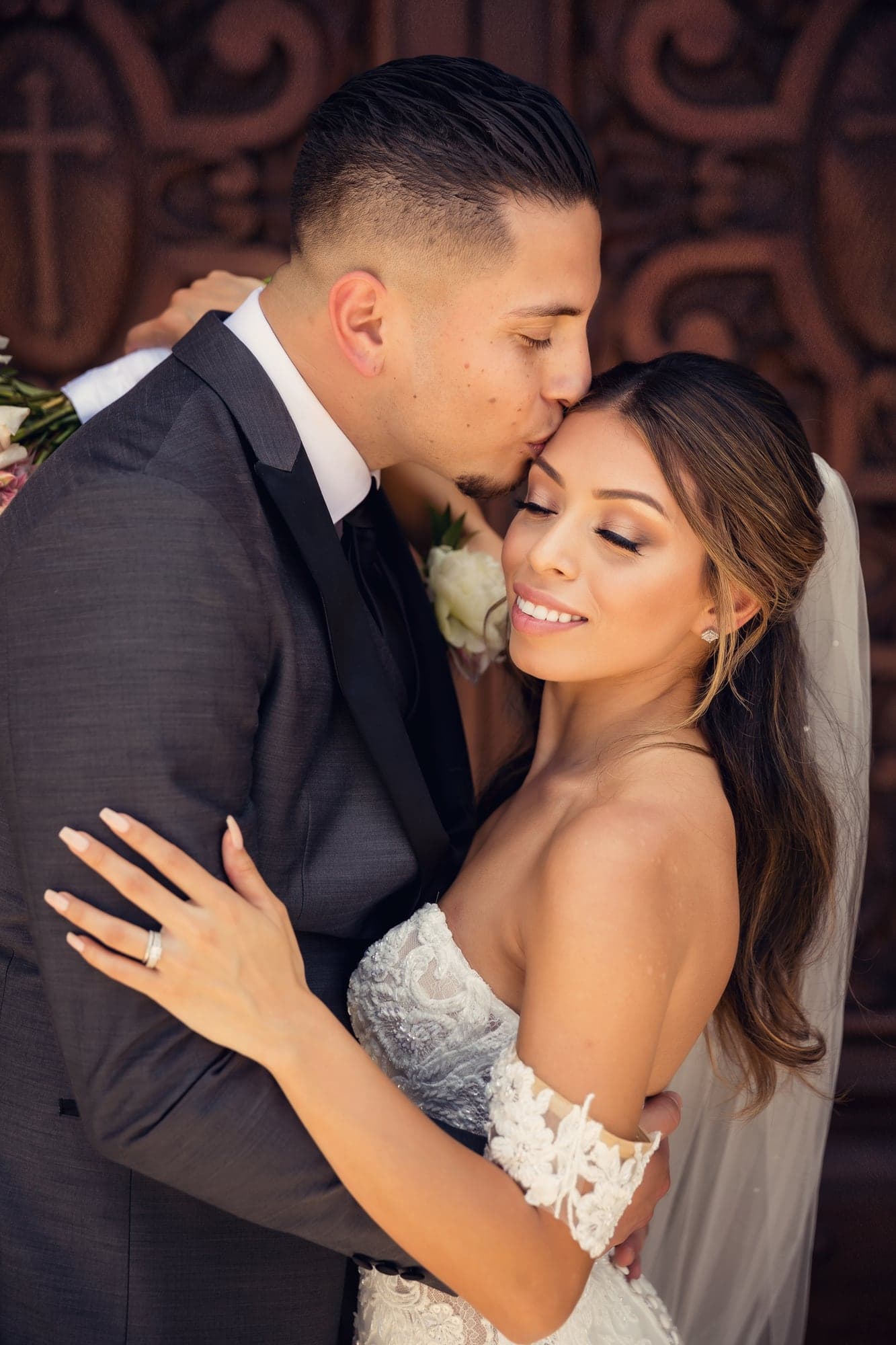 Jennifer and Bryan sharing a close portrait after their ceremony