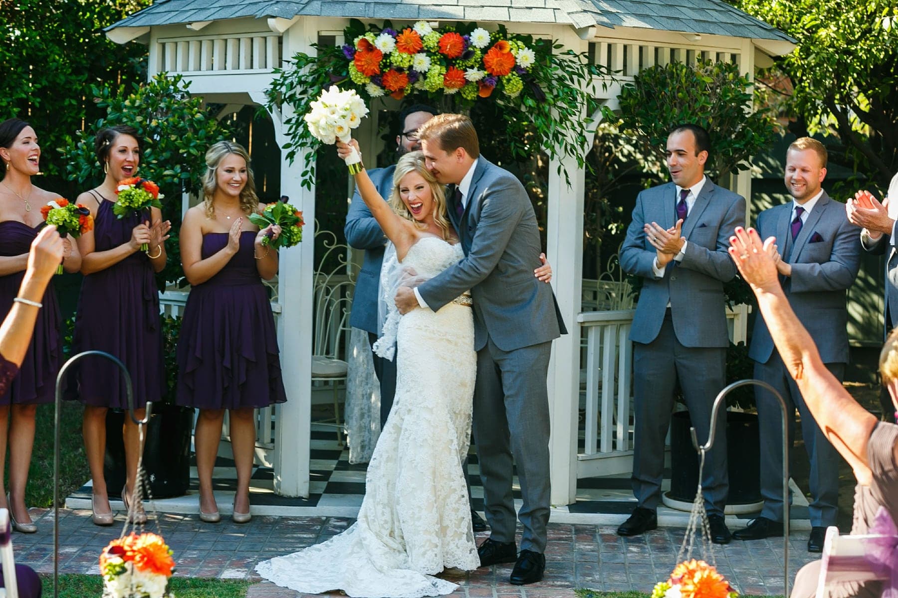 Newlyweds celebrating after their garden ceremony