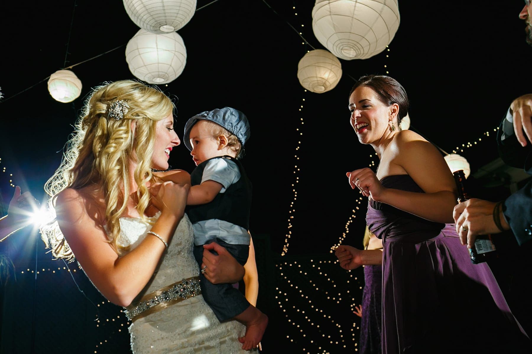 Cake cutting at the outdoor wedding reception
