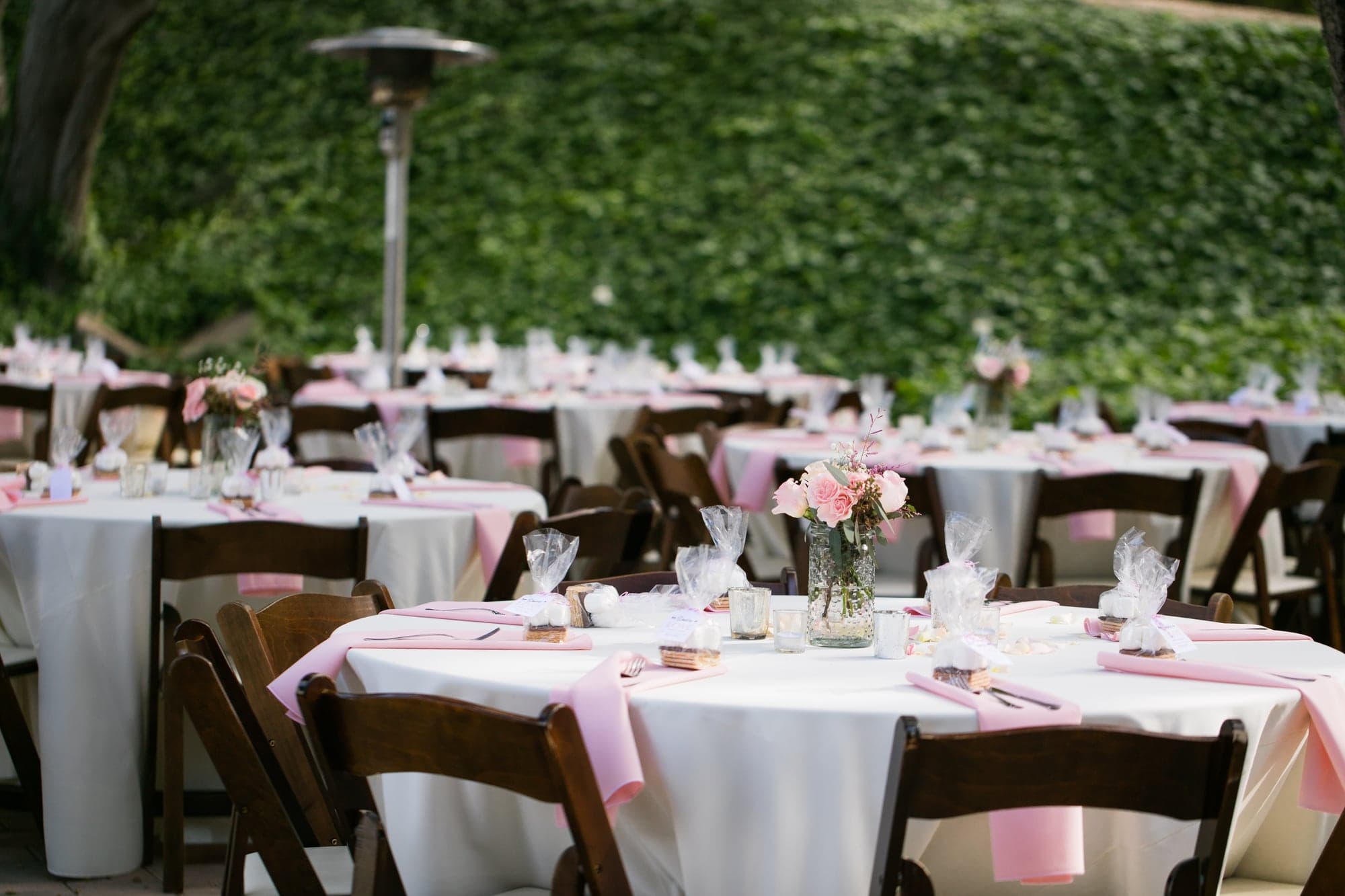 Rustic reception tables with blush details