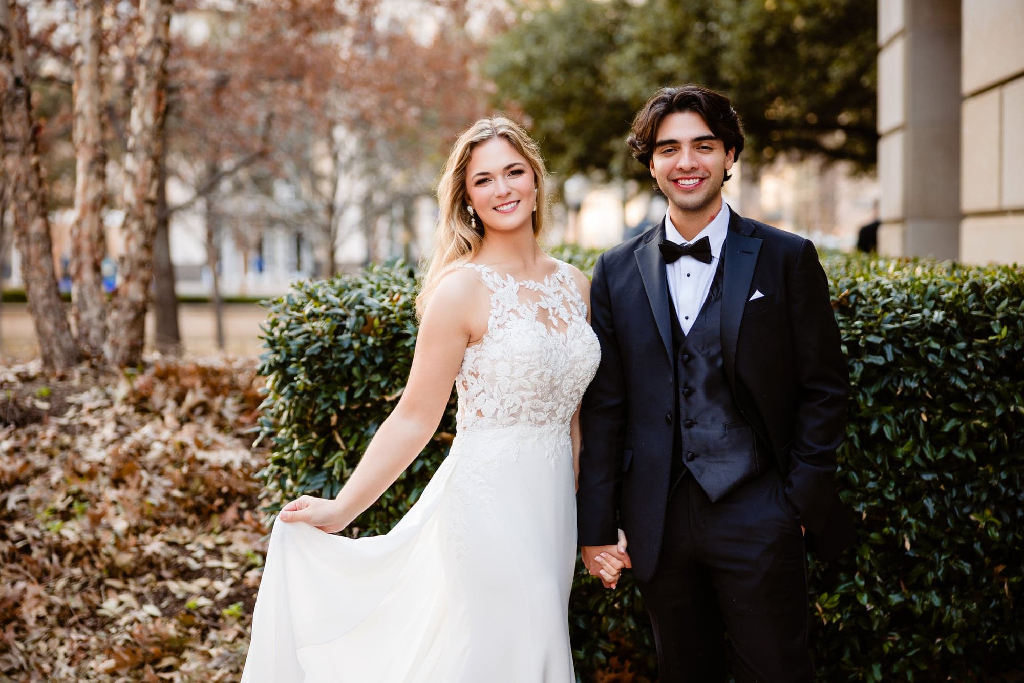 Lindsay and Jayton sharing a golden-hour portrait among winter trees in Dallas