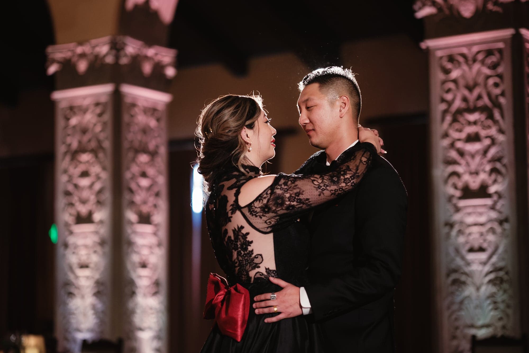 Alda and Kevin embracing during their evening reception