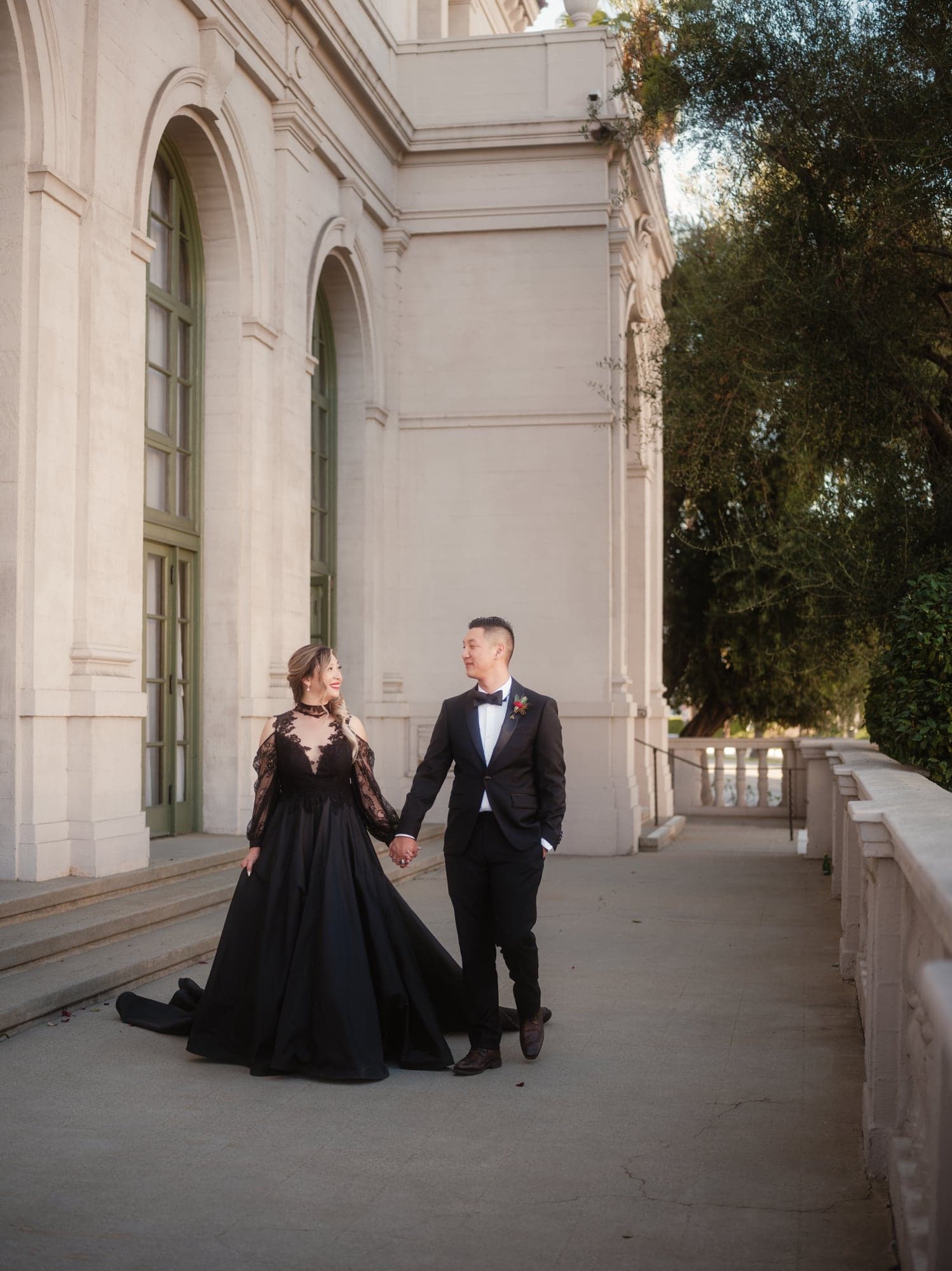 Alda and Kevin standing beneath the arches at The Ebell of Los Angeles