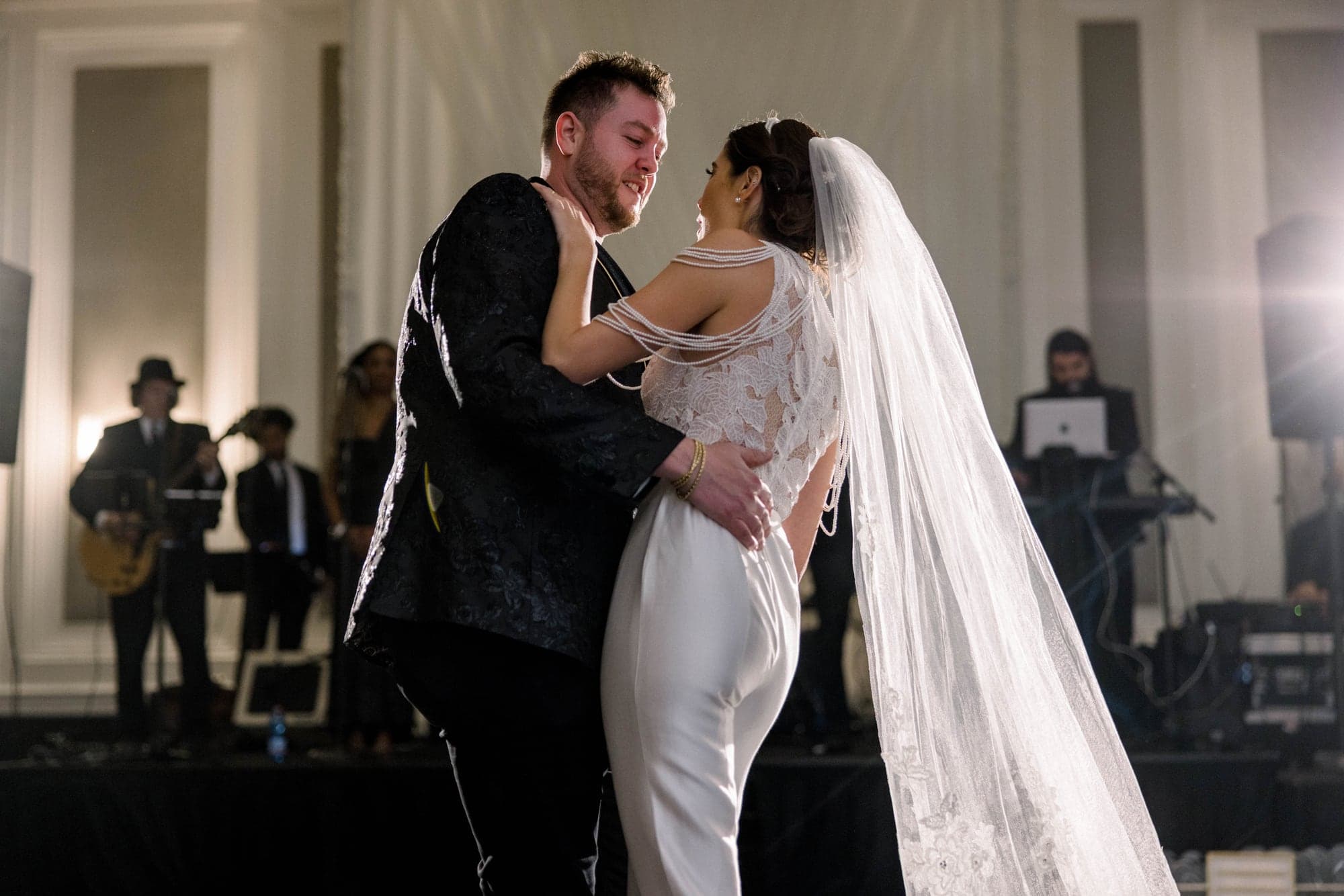 Kylie and Jason sharing their first dance in the Four Seasons Las Vegas ballroom