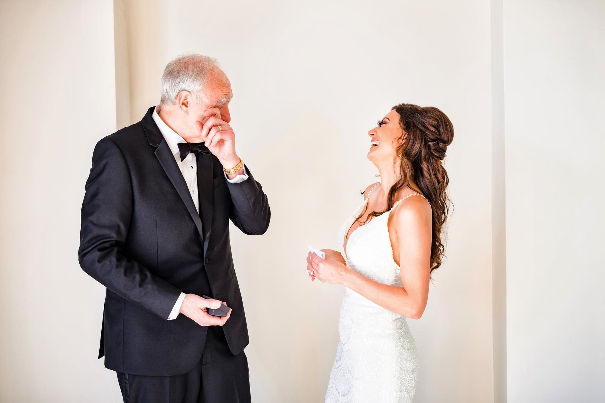 Tina sharing an emotional first look with family before her Grand Solmar wedding