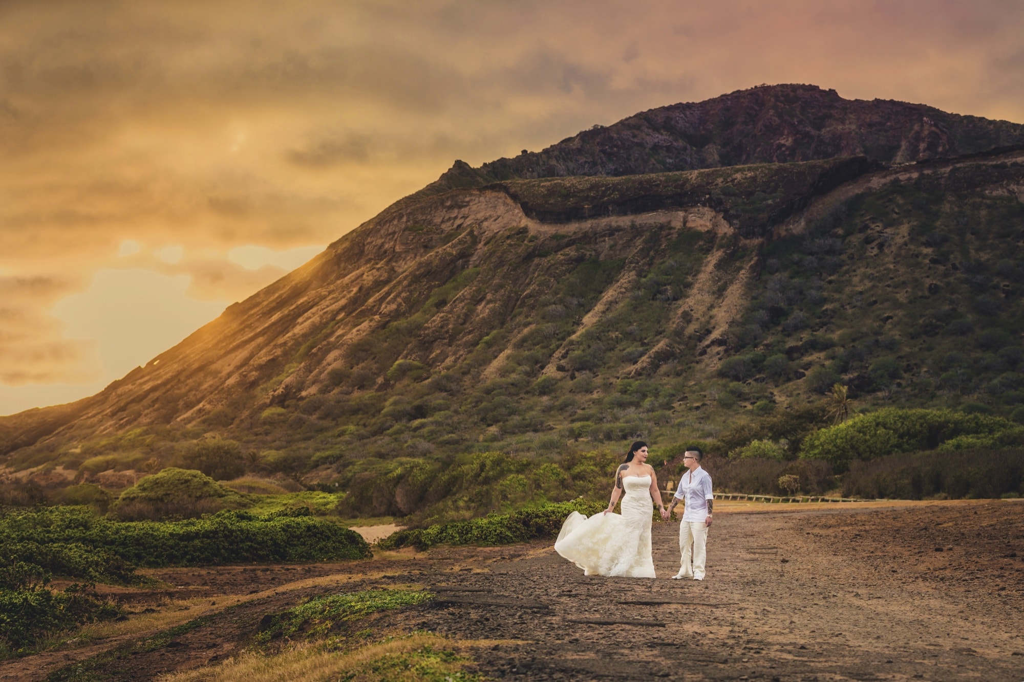 Amanda and Shauna beneath the mountains of Oahu, Hawaii
