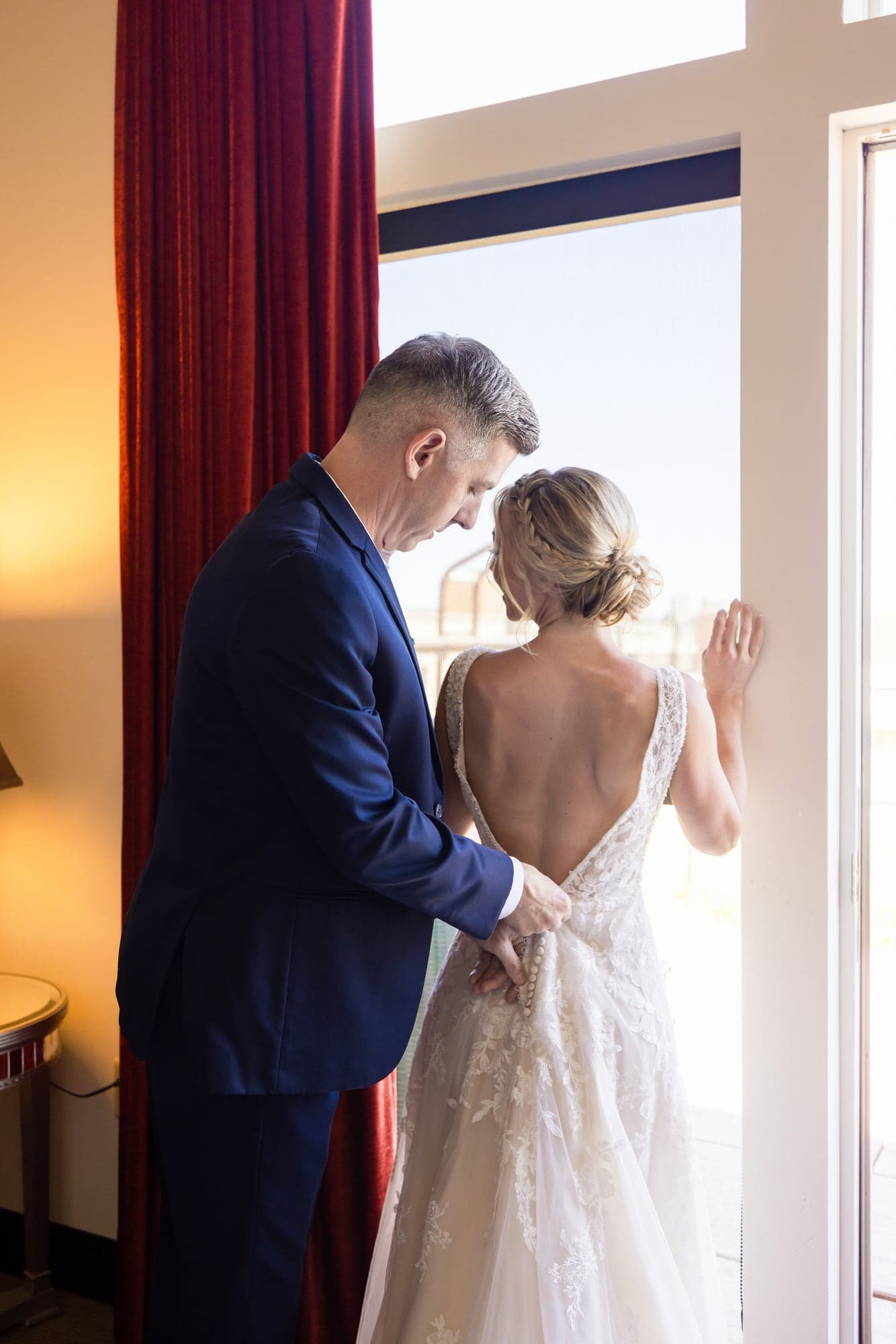 Brittany and Troy sharing a quiet moment while getting ready