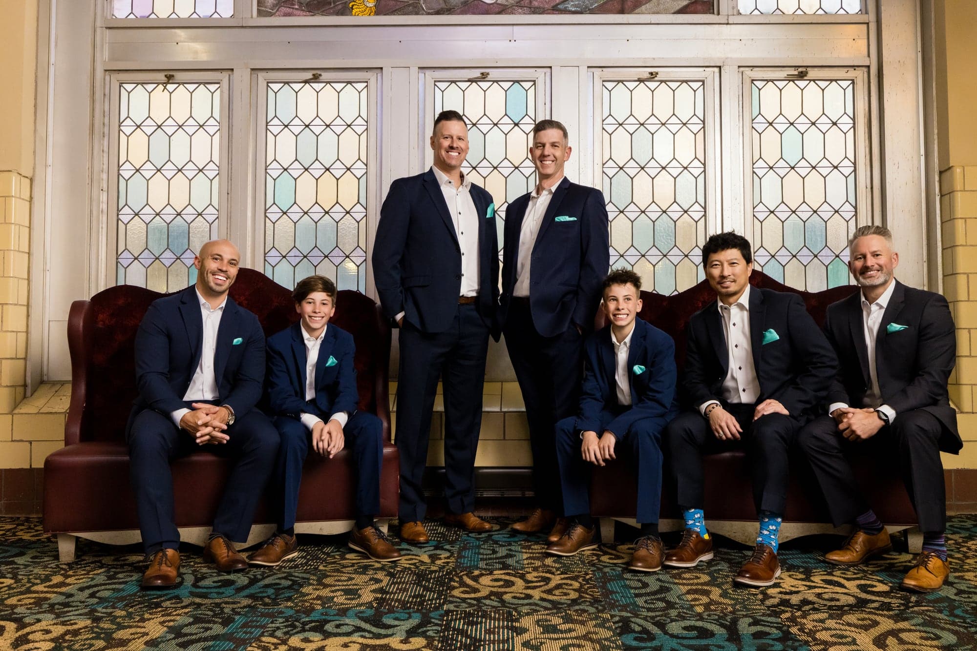 Troy and his wedding party inside The Best Place at Historic Pabst