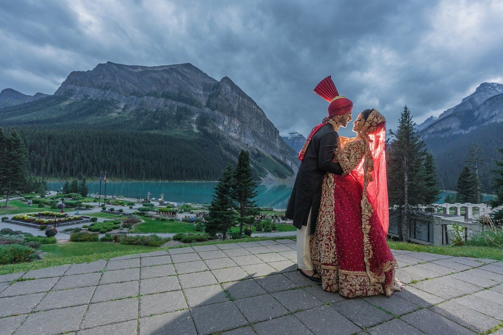 Lubna and Waqas overlooking Lake Louise and the Canadian Rockies