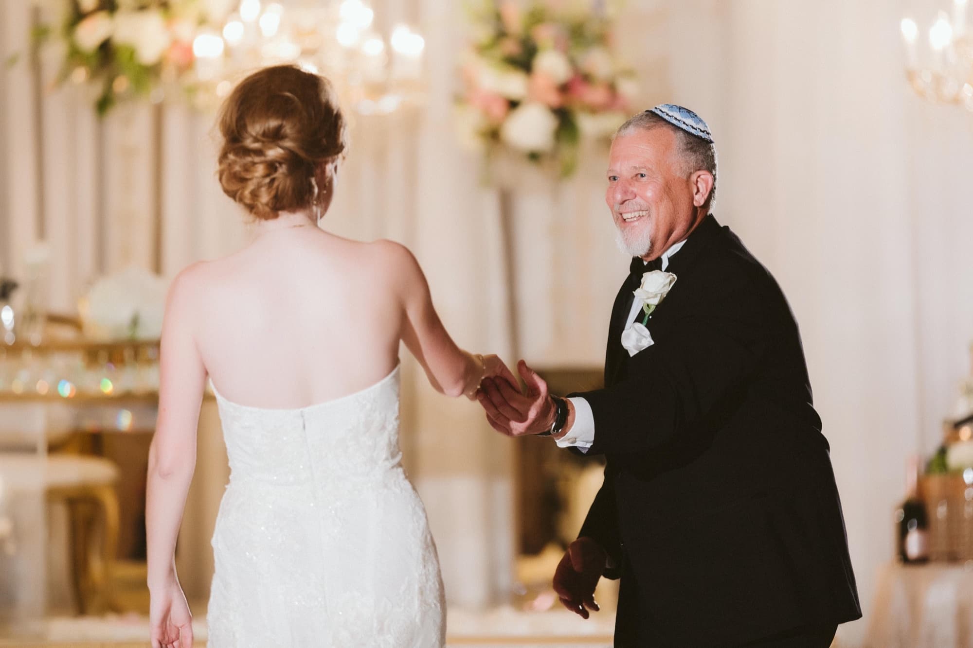 Ilana dancing with her father, who wears a yarmulke, during the reception at The Langham Huntington Pasadena
