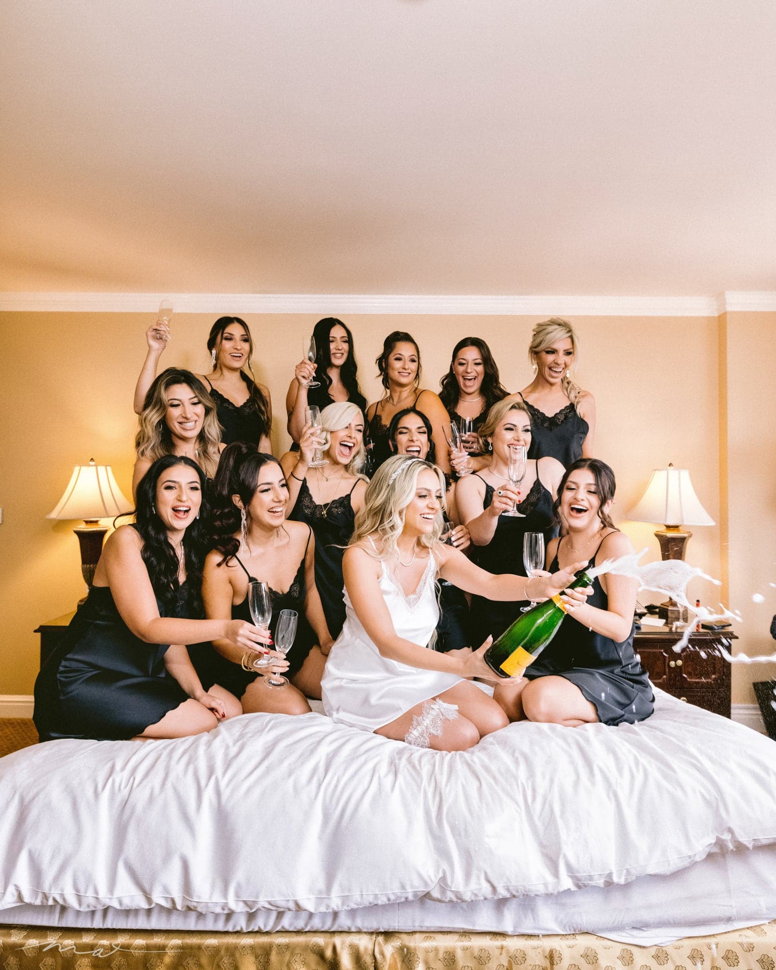 Melody celebrating with her bridesmaids