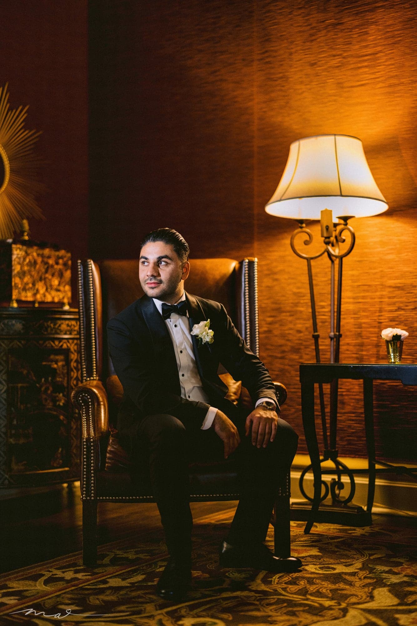 Hrand in a black tuxedo inside The Langham