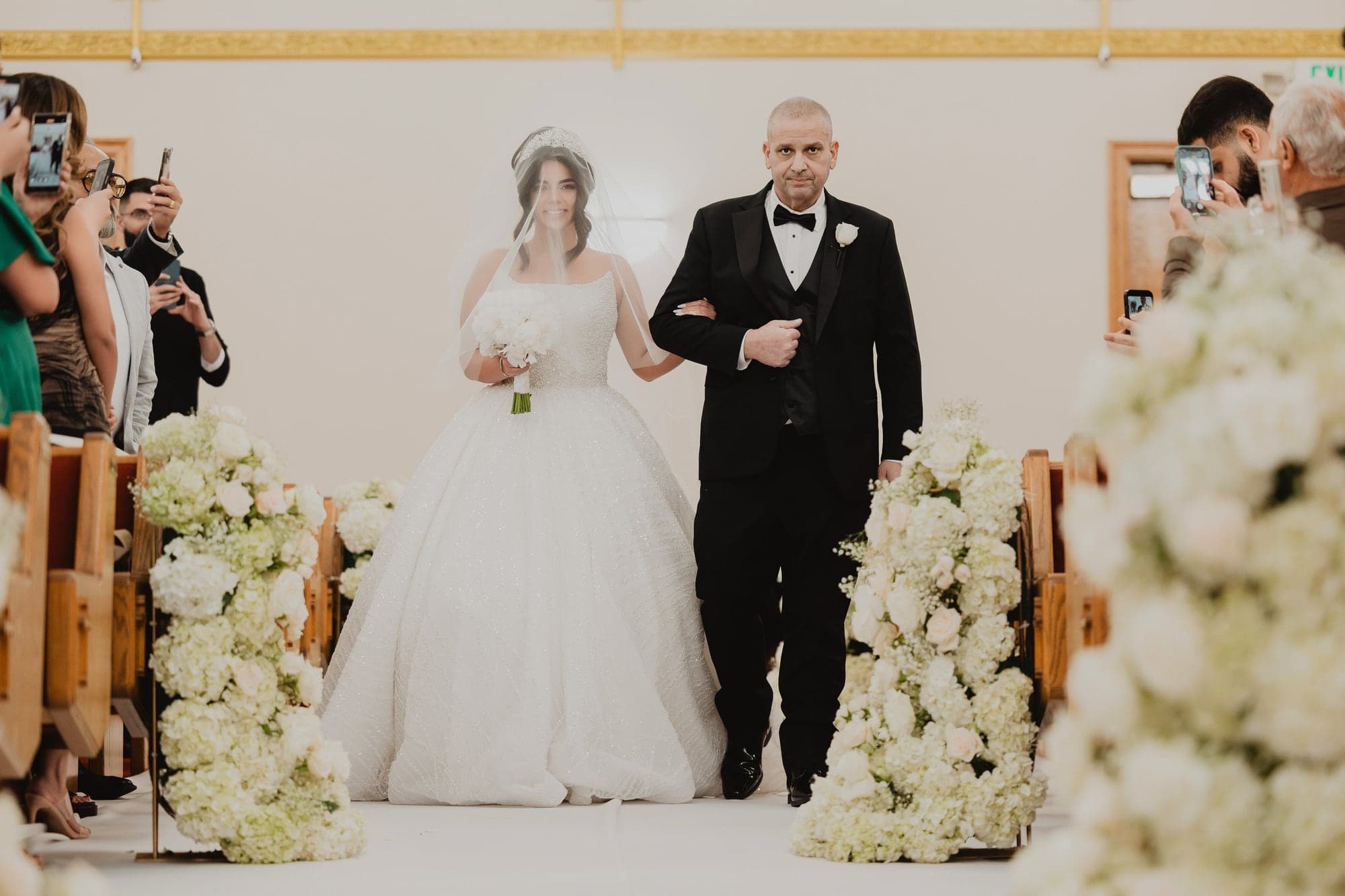 Amanda entering Mar Zaia Cathedral with her family