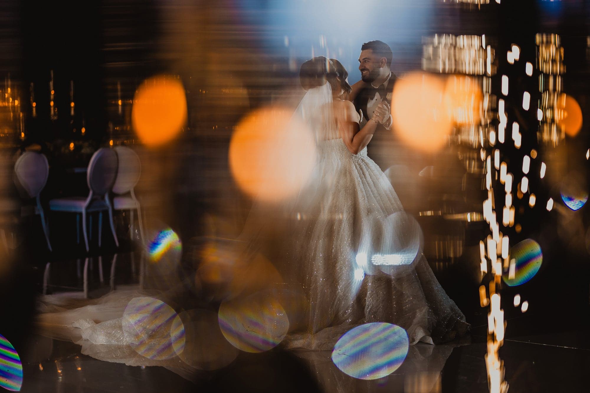 Amanda and Anthony surrounded by family and friends on the dance floor