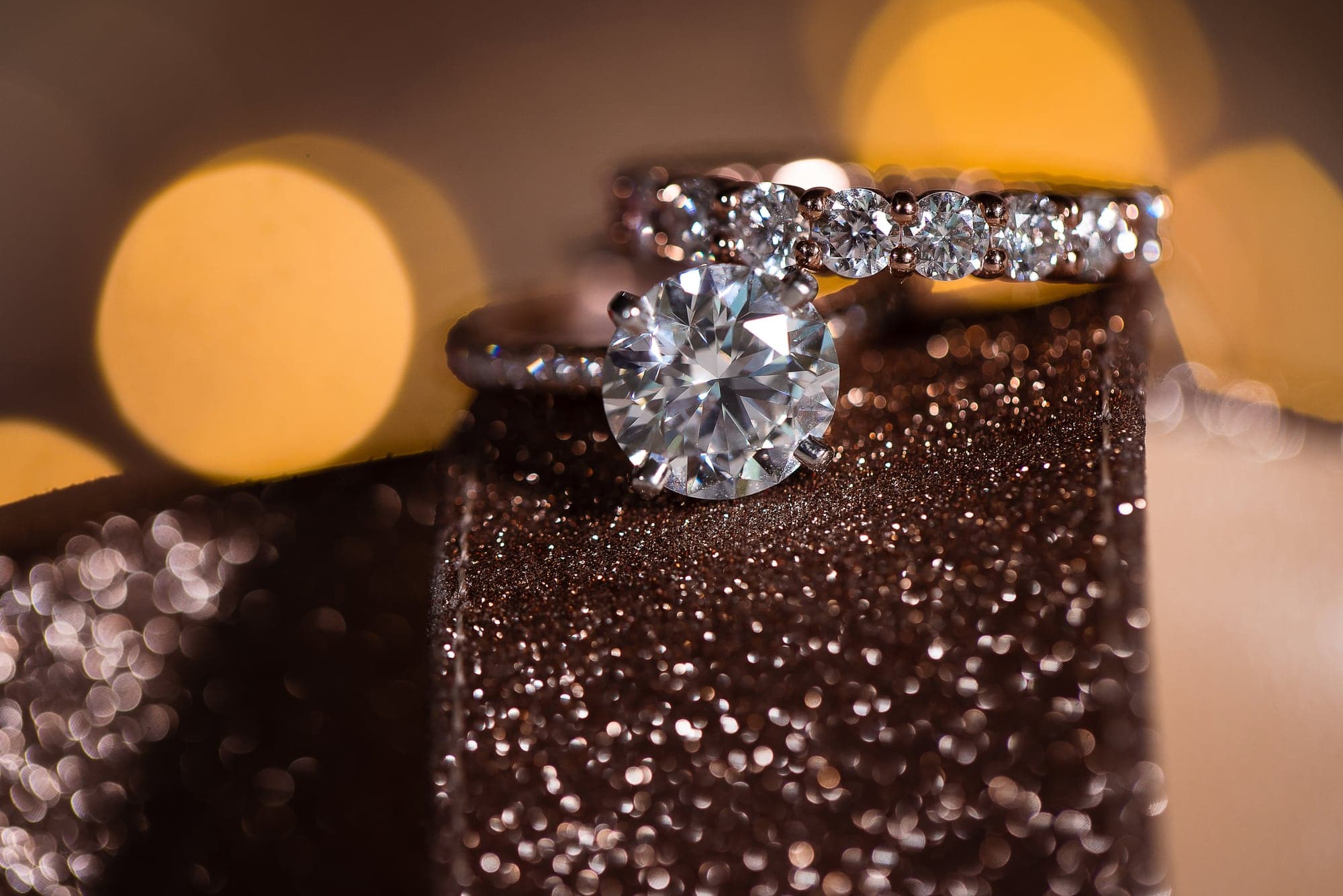 Diamond wedding rings in warm light