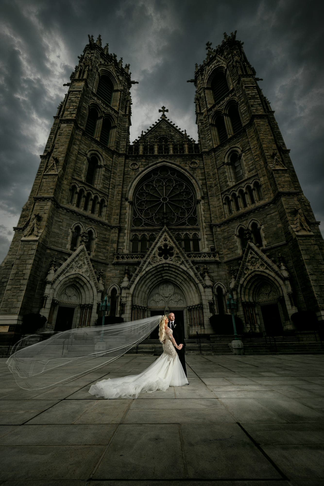 Kaitelyn outside the cathedral beneath its Gothic facade