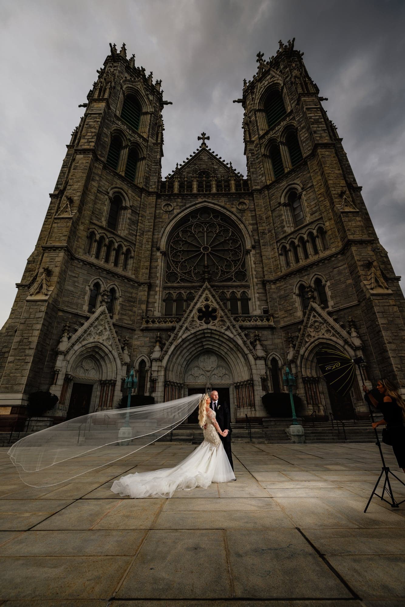 Kaitelyn outside the cathedral beneath its Gothic facade