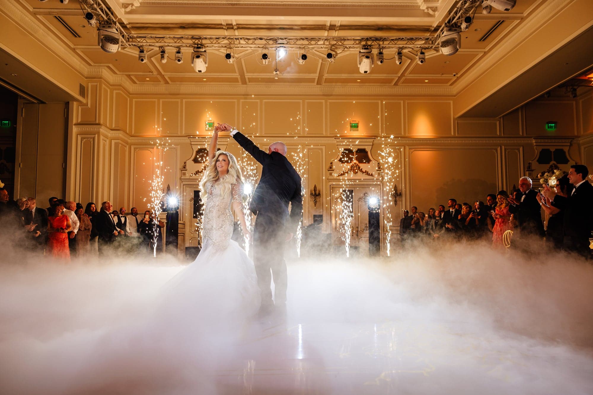 Kaitelyn and Blaise dancing beneath low fog at The Legacy Castle
