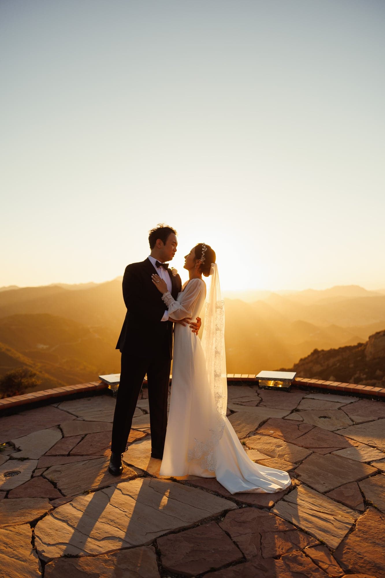 Close golden-hour portrait of Lauren and Lee