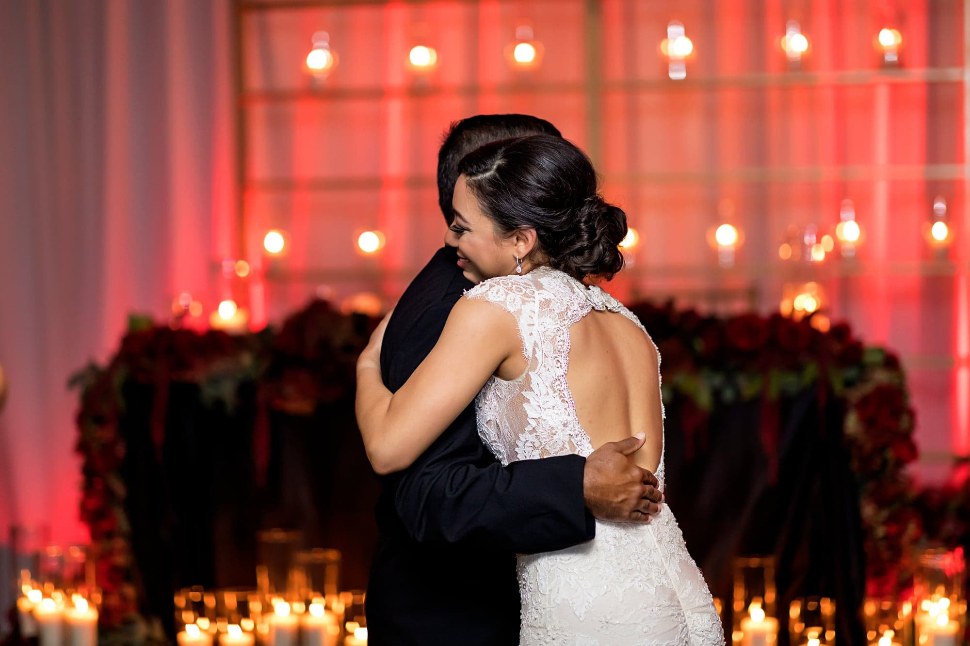 Two brides dancing together at their reception