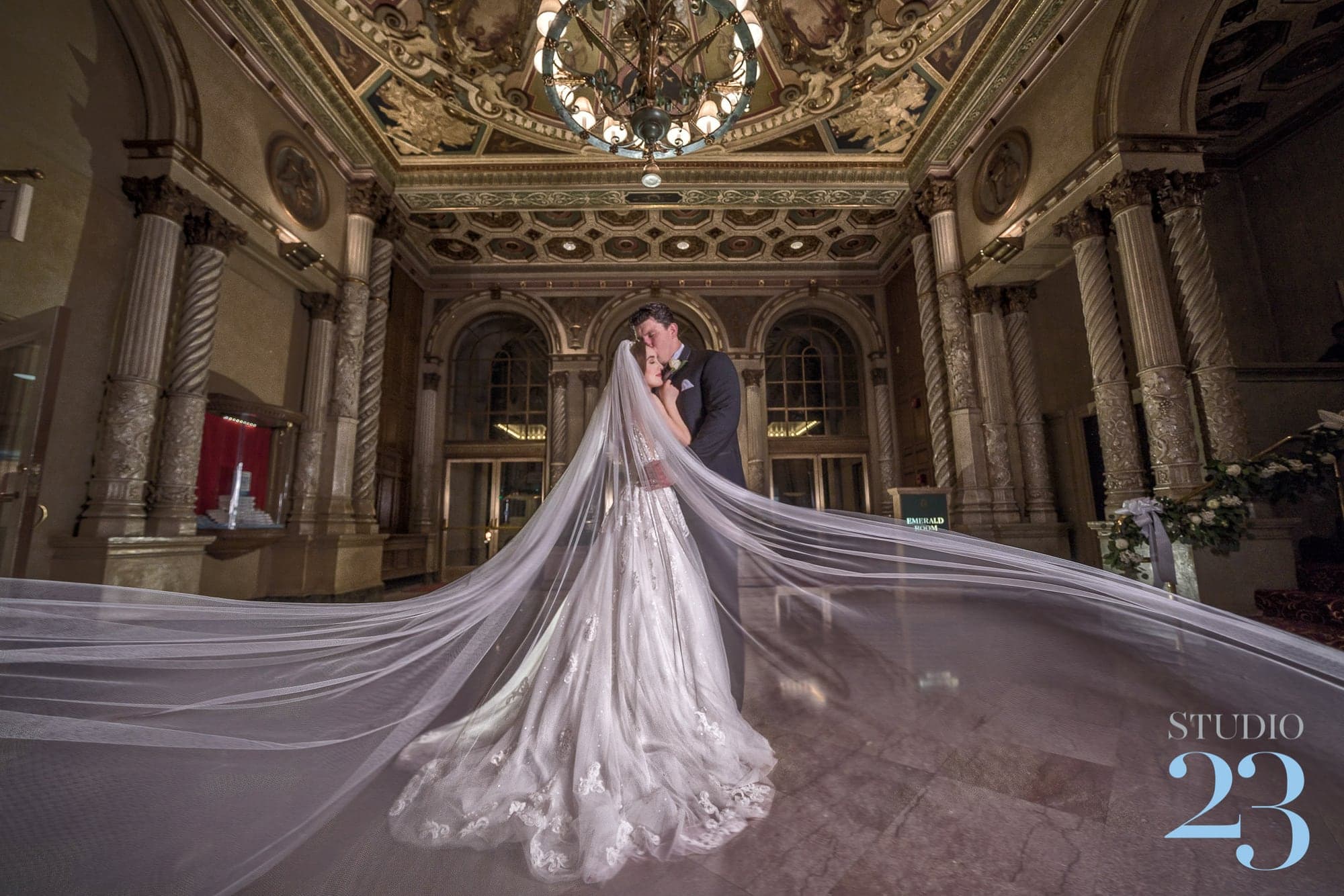 Samantha and Andrew beneath the ornate ceiling of the Millennium Biltmore