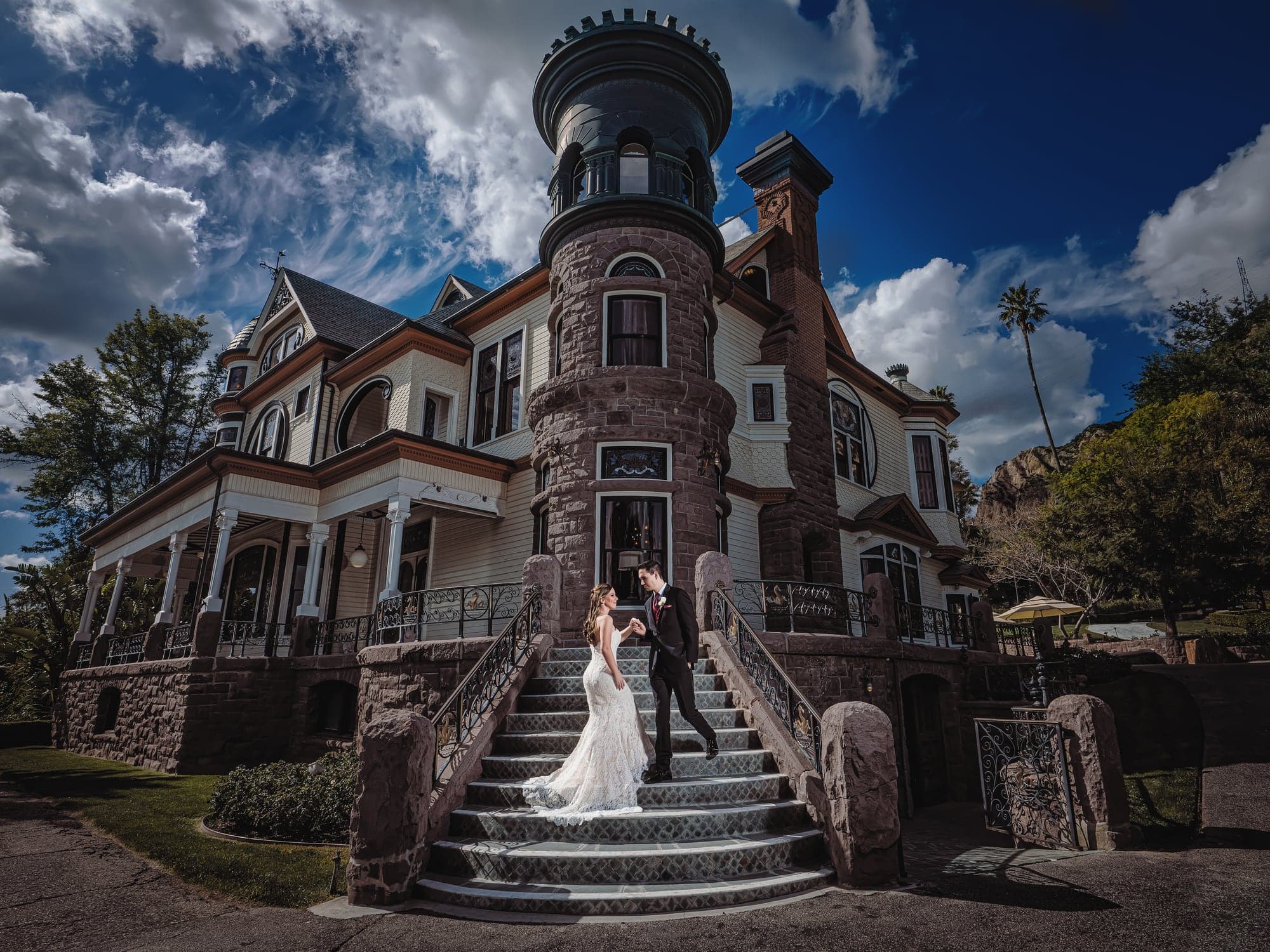 Chelsea and Greg outside historic Newhall Mansion