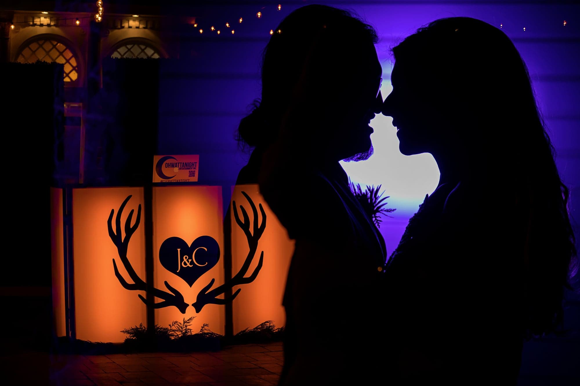 Night silhouette of Courtney and John