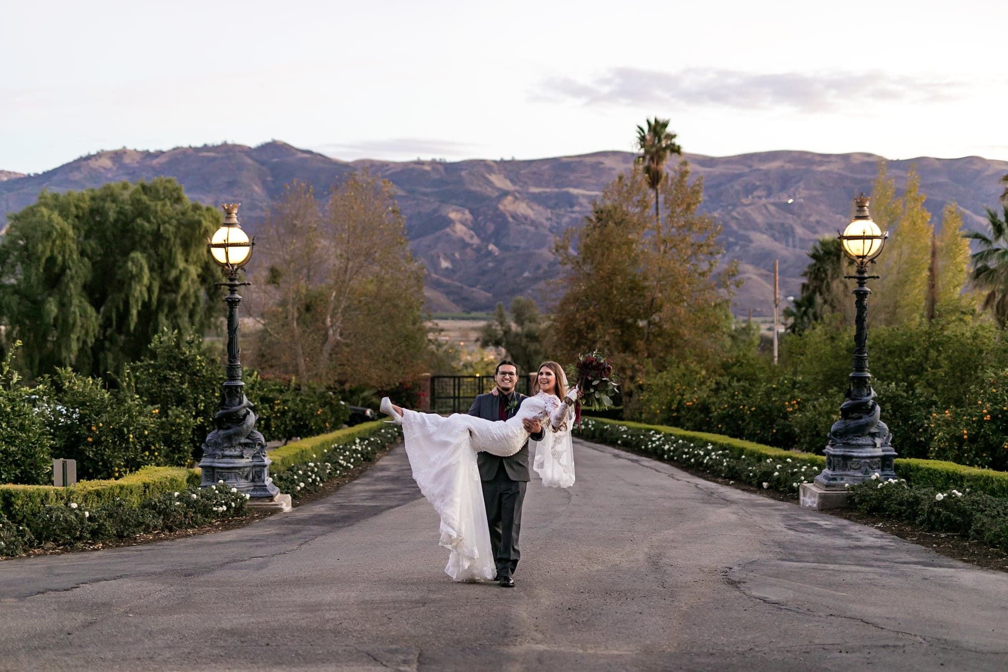 Courtney and John overlooking the mountains at Newhall Mansion