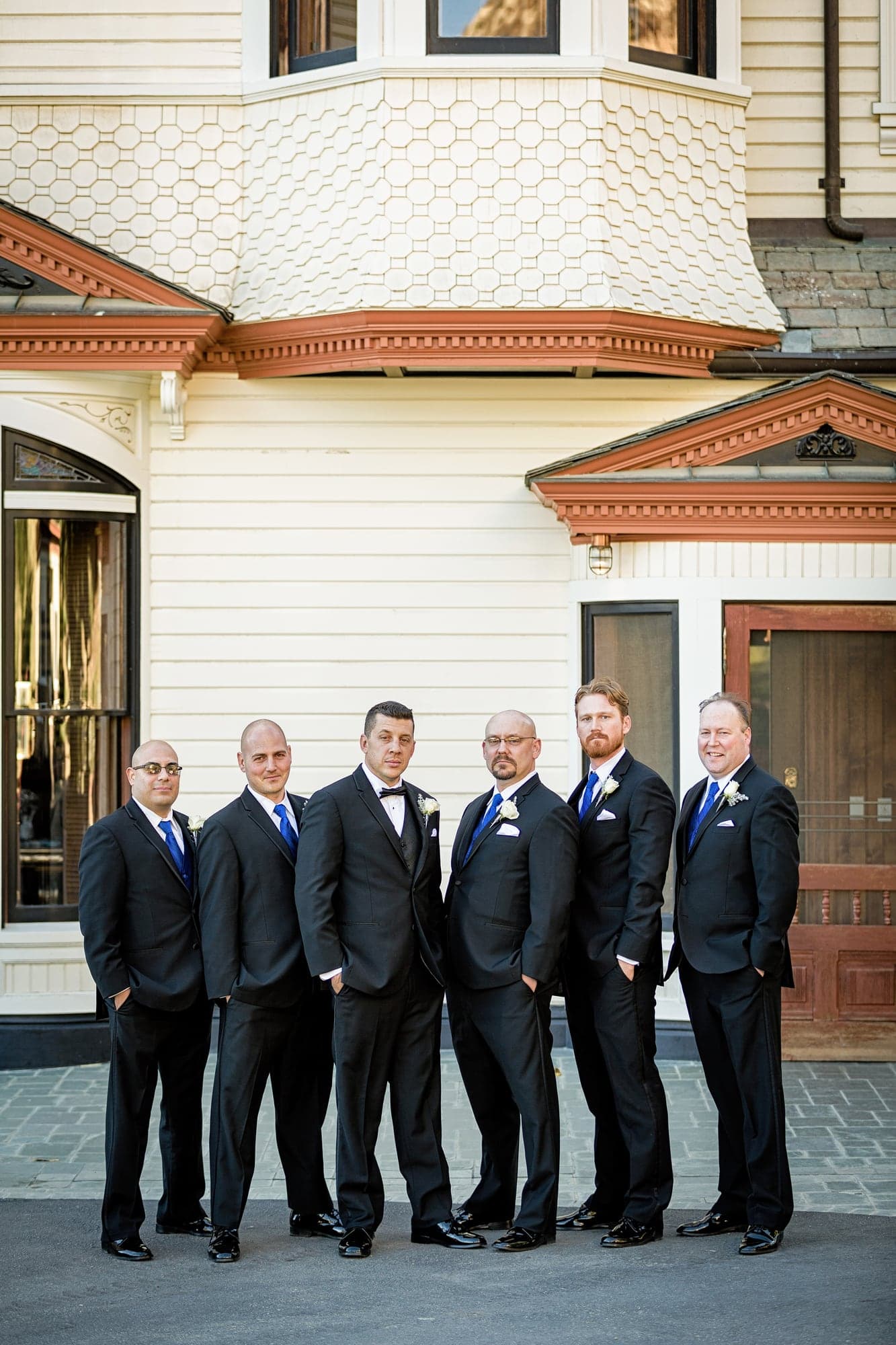 Josh with his groomsmen outside Newhall Mansion